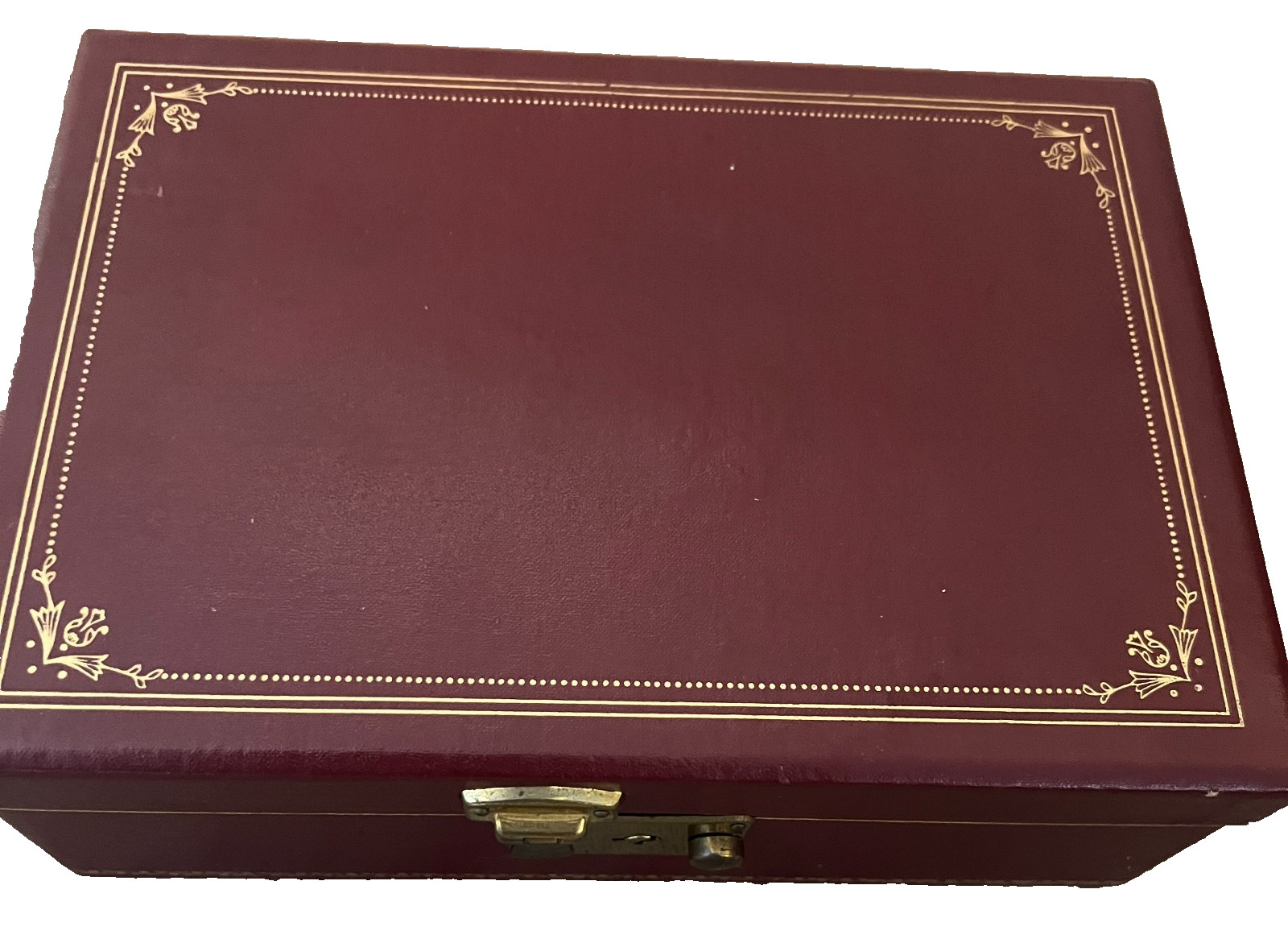 Vintage Mele jewelry box features burgundy leatherette