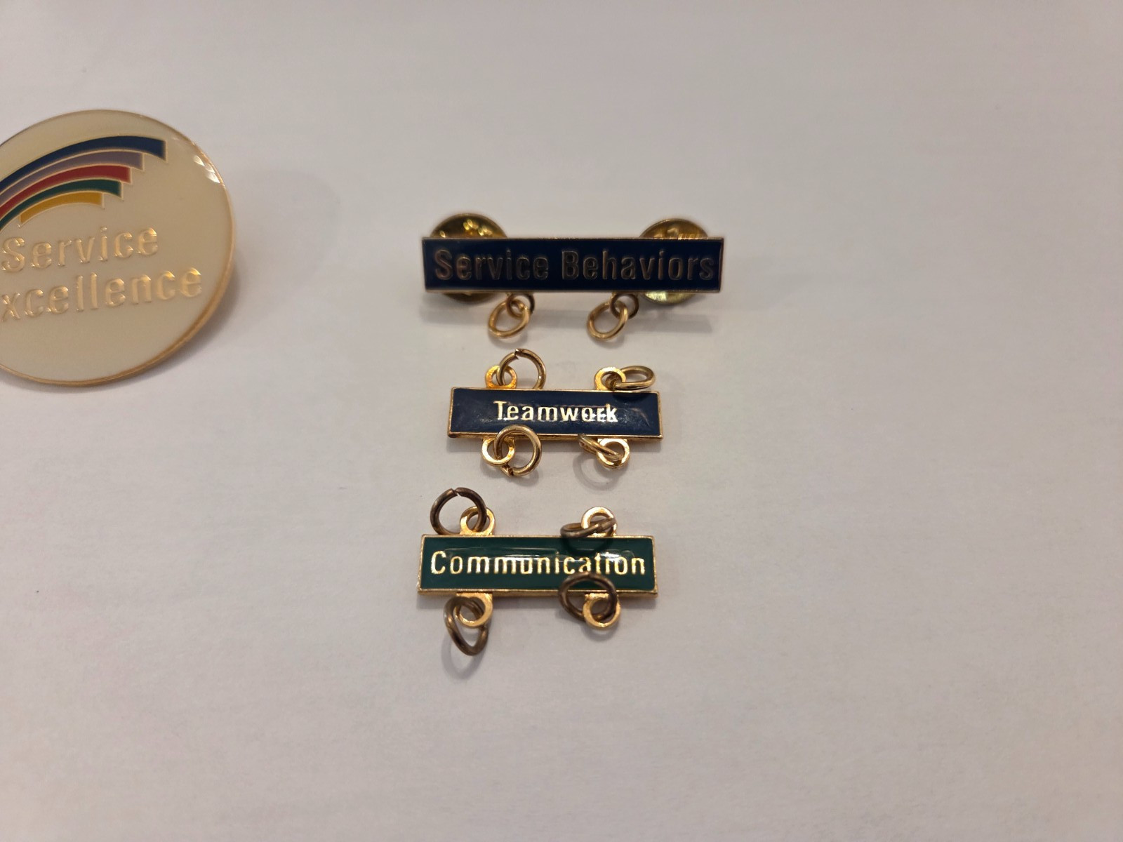 Vintage Service Excellence Pin and Corporate Merit Service Behavior Badges