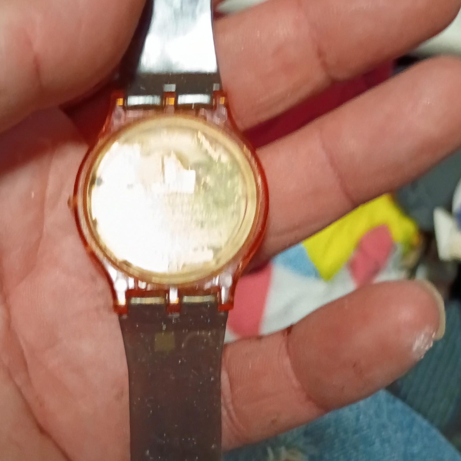 Translucent Orange Plastic Analog Wristwatch 12-Hour Multicolor Dial Brown