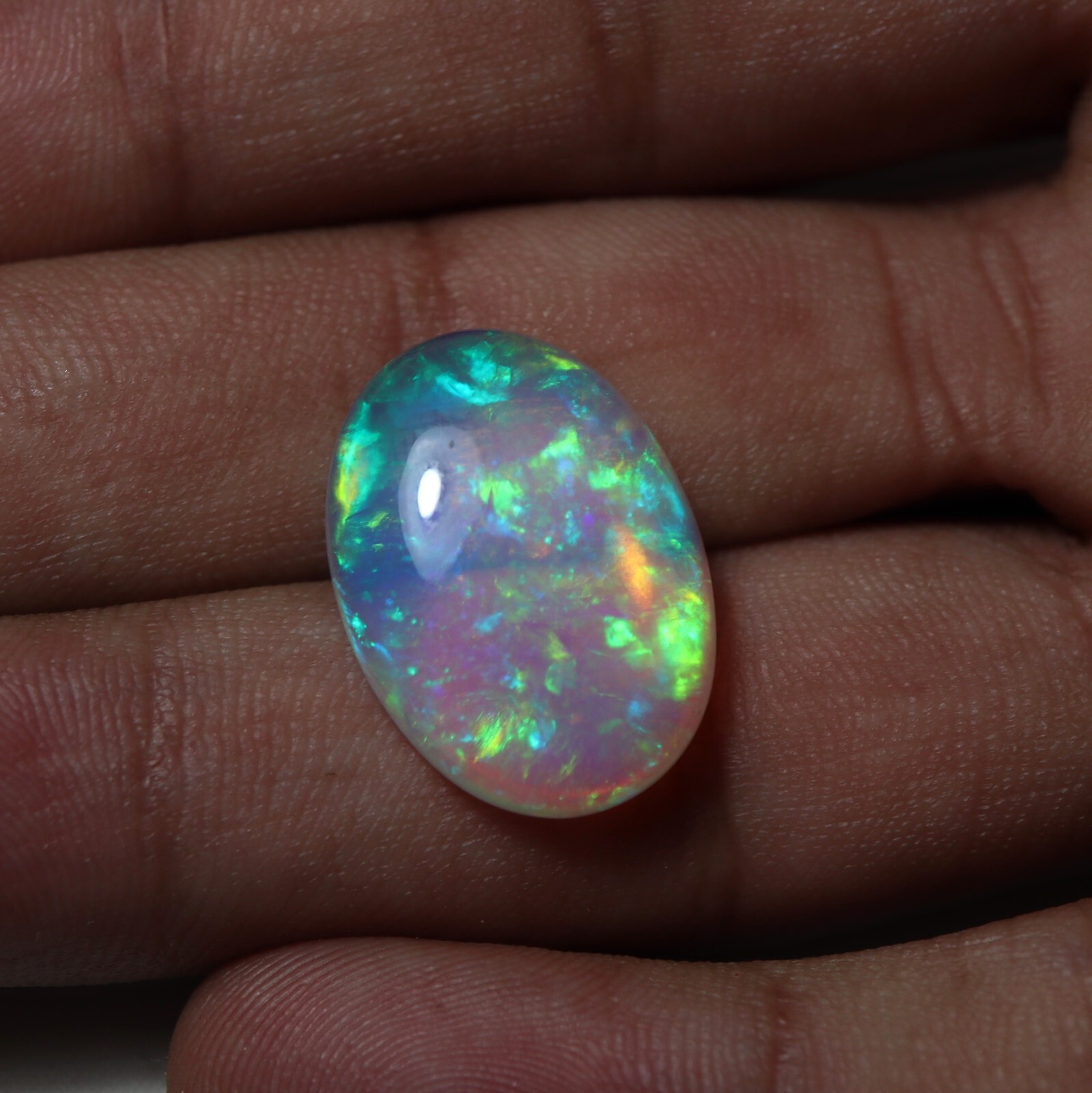 12.1 Ct 21.3×15.4 MM Natural AAA+ Multi Flashy Fire Ethiopian Opal Oval Cabochon