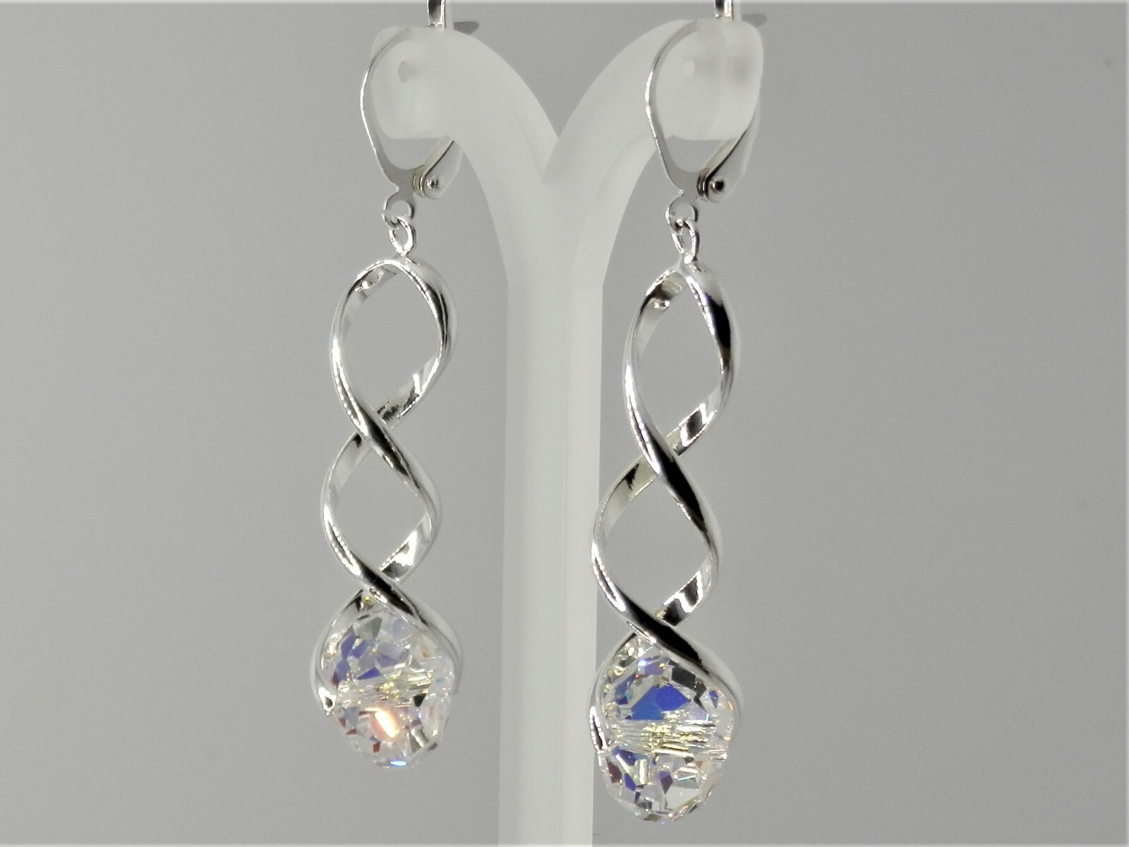 Austrian Crystal, clear with AB, spiral silver plated, clip-on, lever back