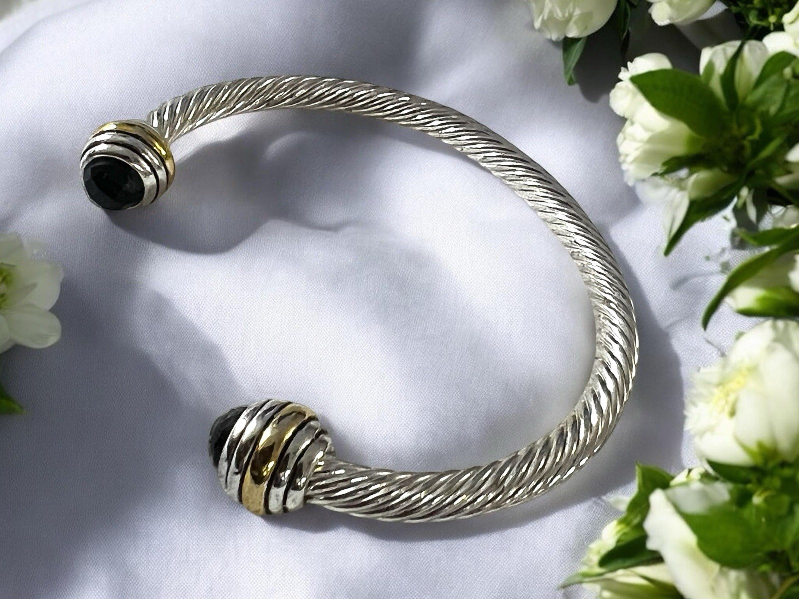 Silver Tone Twisted Open Cuff Bracelet with Black Faceted Stone Ends