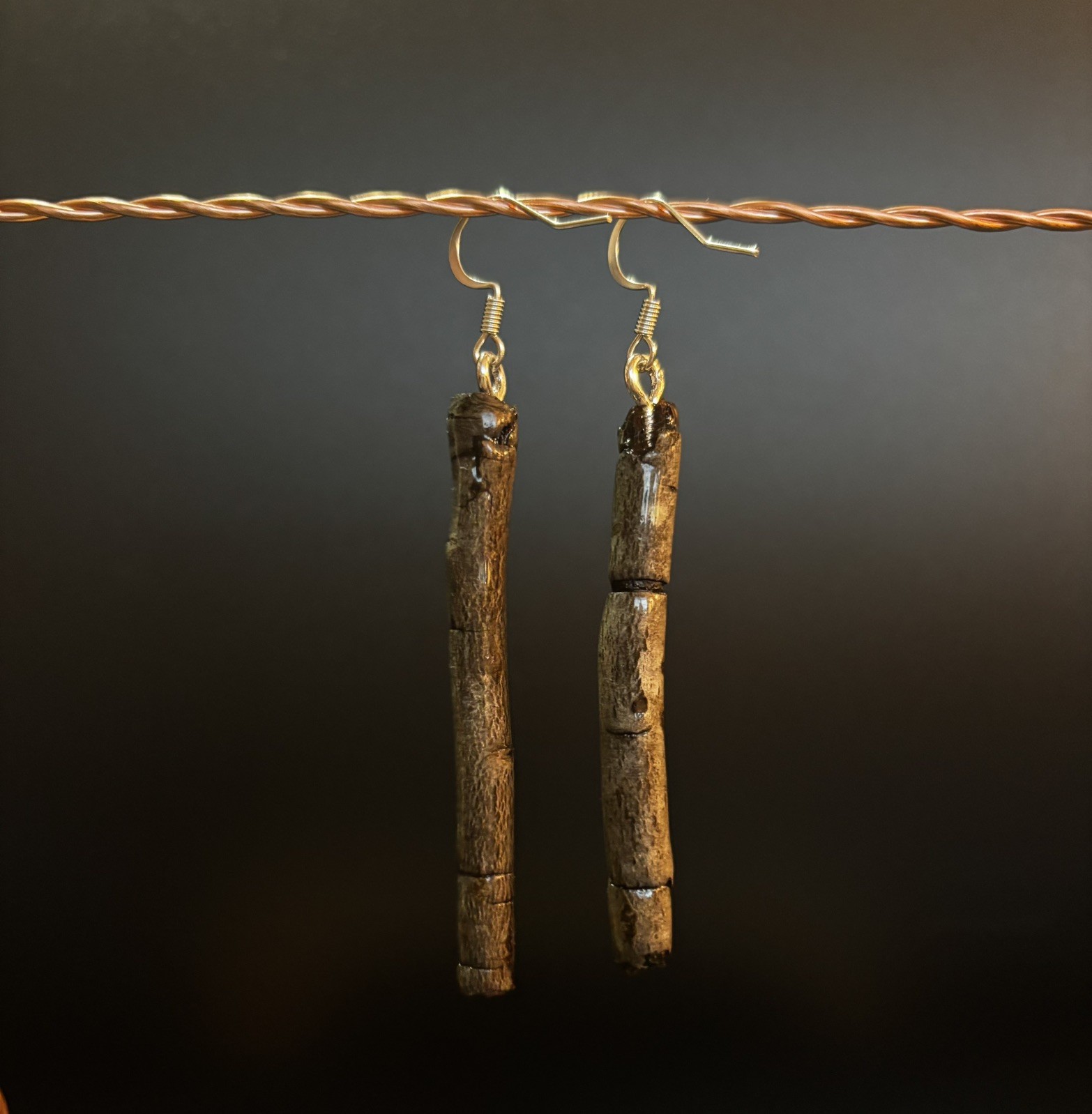 One of a kind jewelry made from real pieces of wood coated in resin
