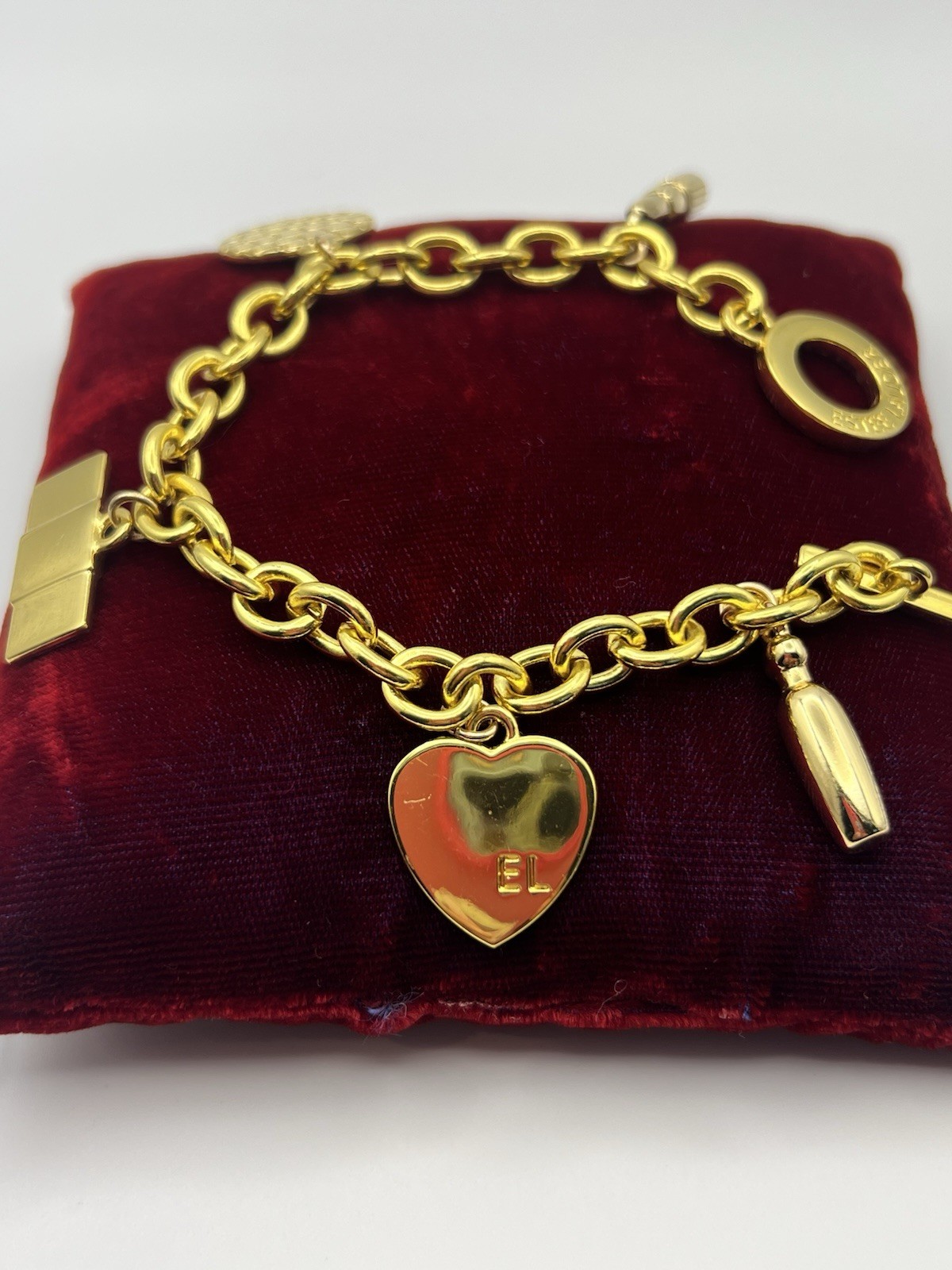 Vintage ESTEE LAUDER Runway Gold Tone Charm Bracelet Couture 7.5 ”