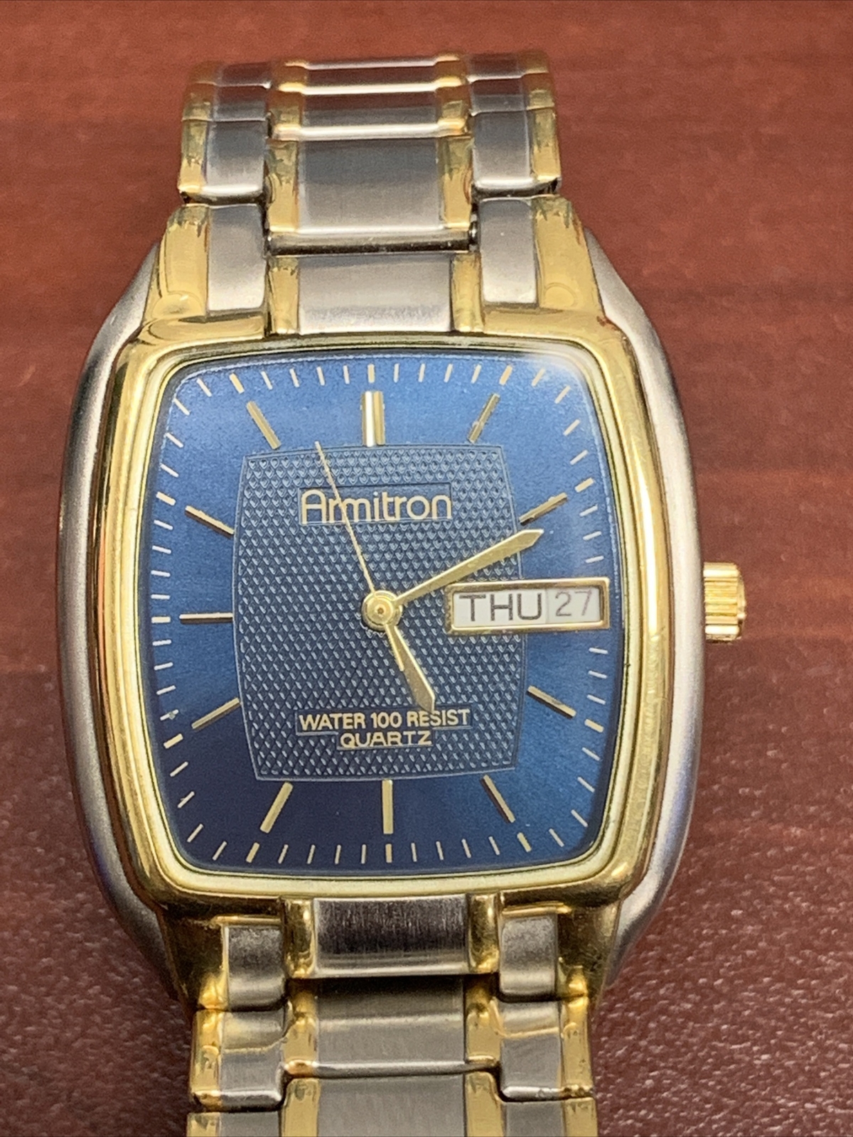 Armitron Watch Silver & Gold Toned Band Rectangular Blue Face Day Date Indicator