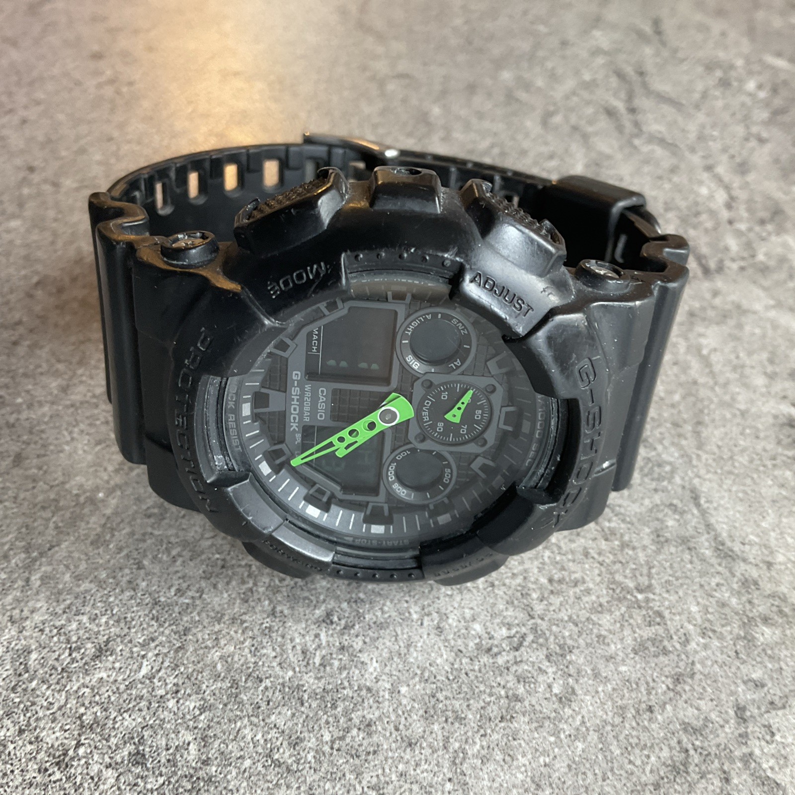 Casio G-Shock Black & Green Analog & Digital Watch – GA-100C 51mm Case – B-X
