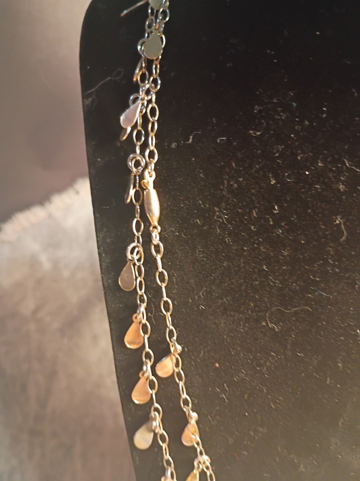 Gold Toned Tear Drop Charmed 56 Inch Taper Single Strand Necklace. J2
