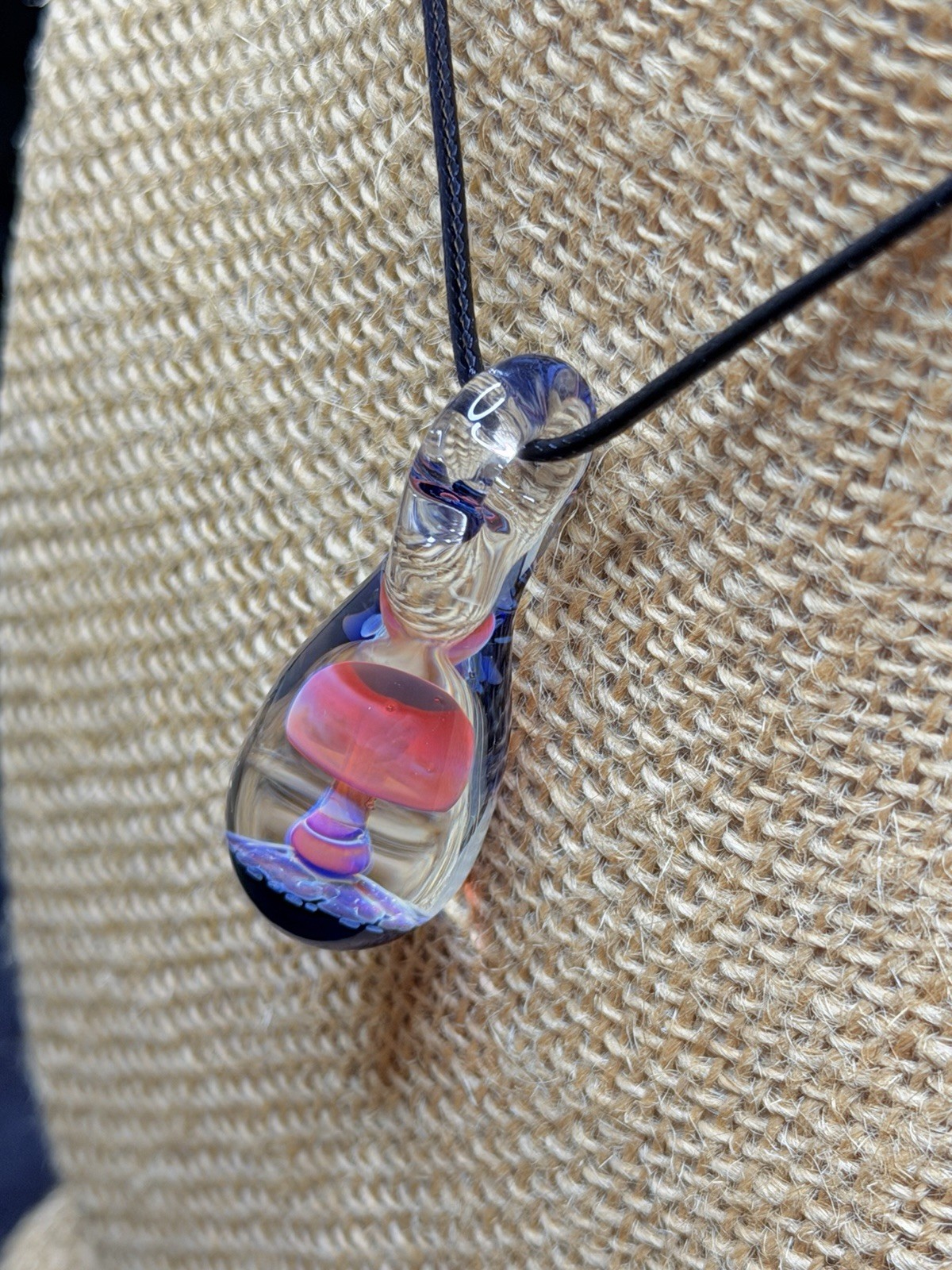 Glass Teardrop Mushroom Pendant in reds and purples with cobalt blue base
