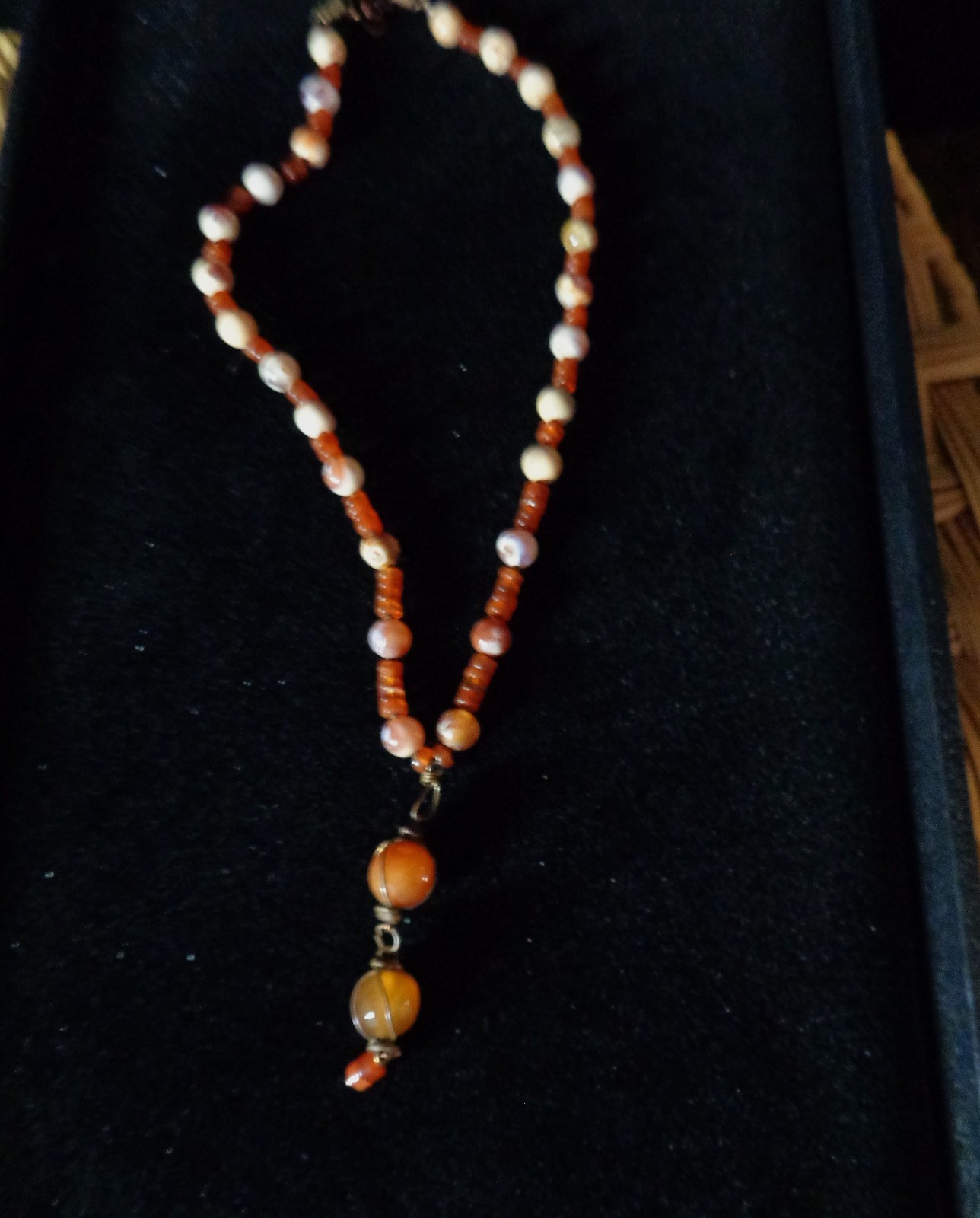Artisan crafted,3” caged faceted red agate and carnelian pendant, on 18” hand kn