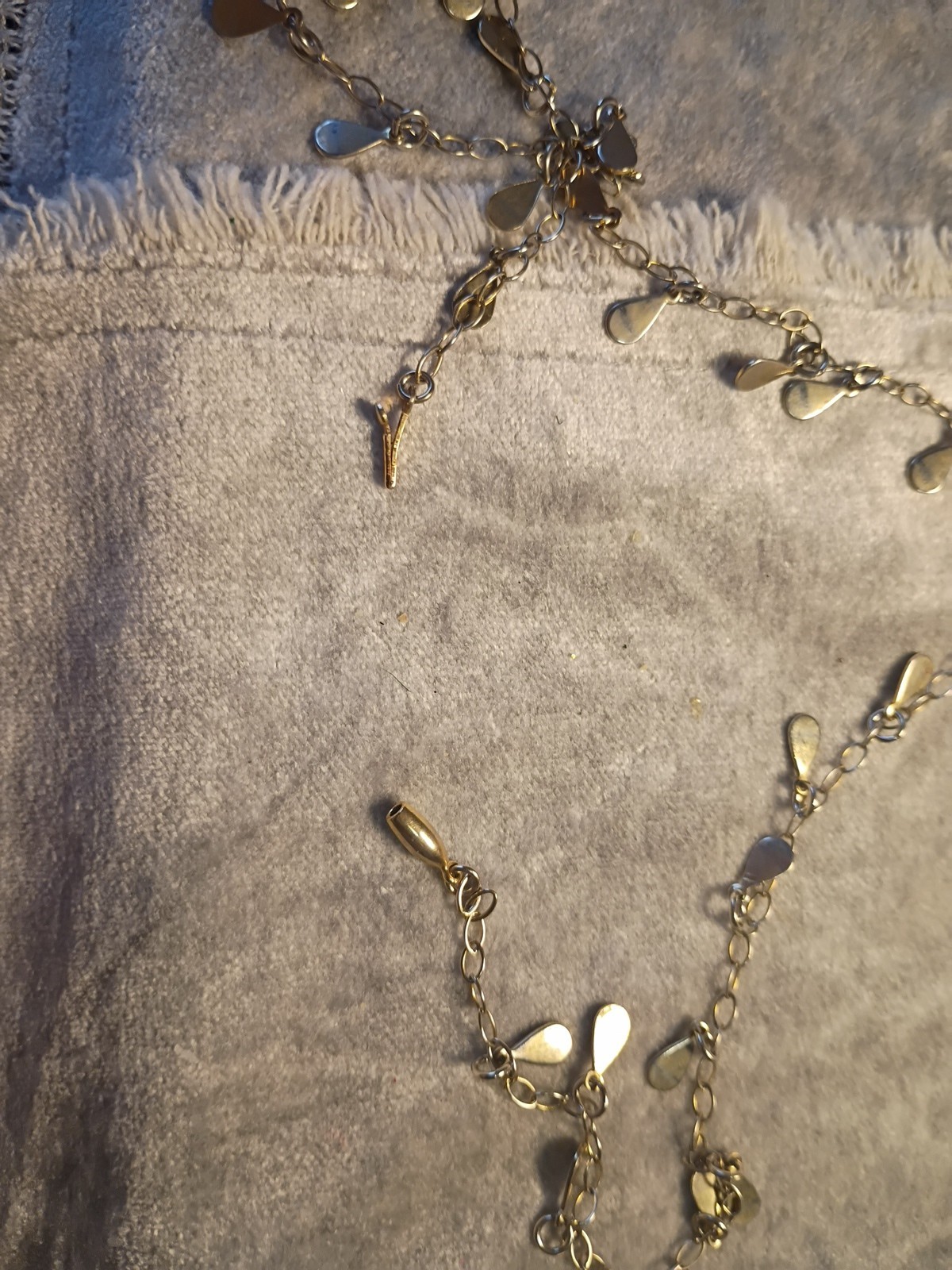 Gold Toned Tear Drop Charmed 56 Inch Taper Single Strand Necklace. J2