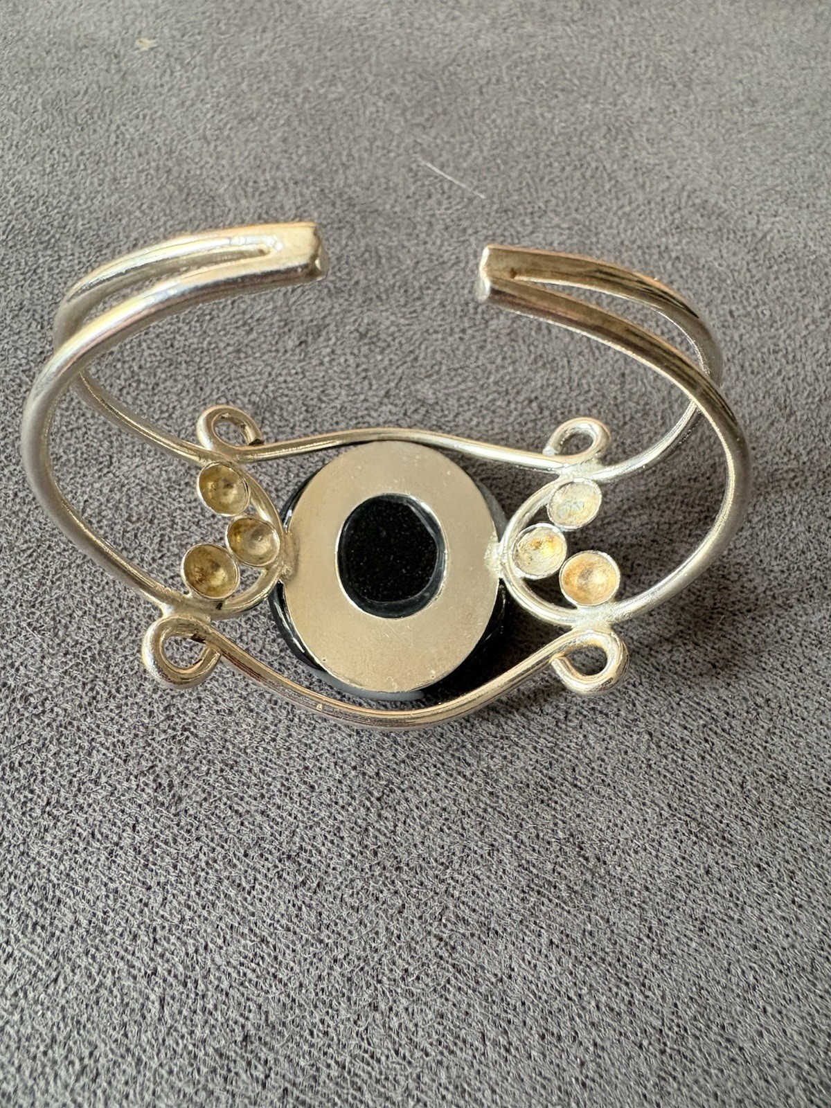 Silver wire cuff bracelet with circular dichroic glass black/gray cabochon