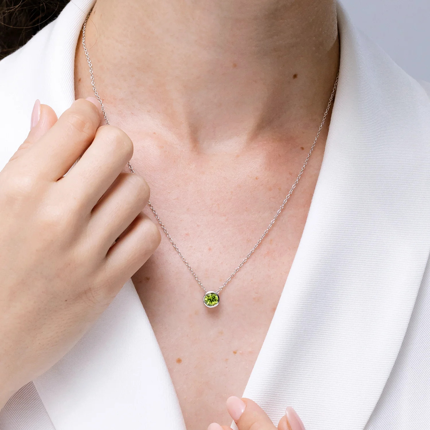 Angara Natural Bezel-Set Round 1.4 ct Peridot Solitaire Pendant in Silver