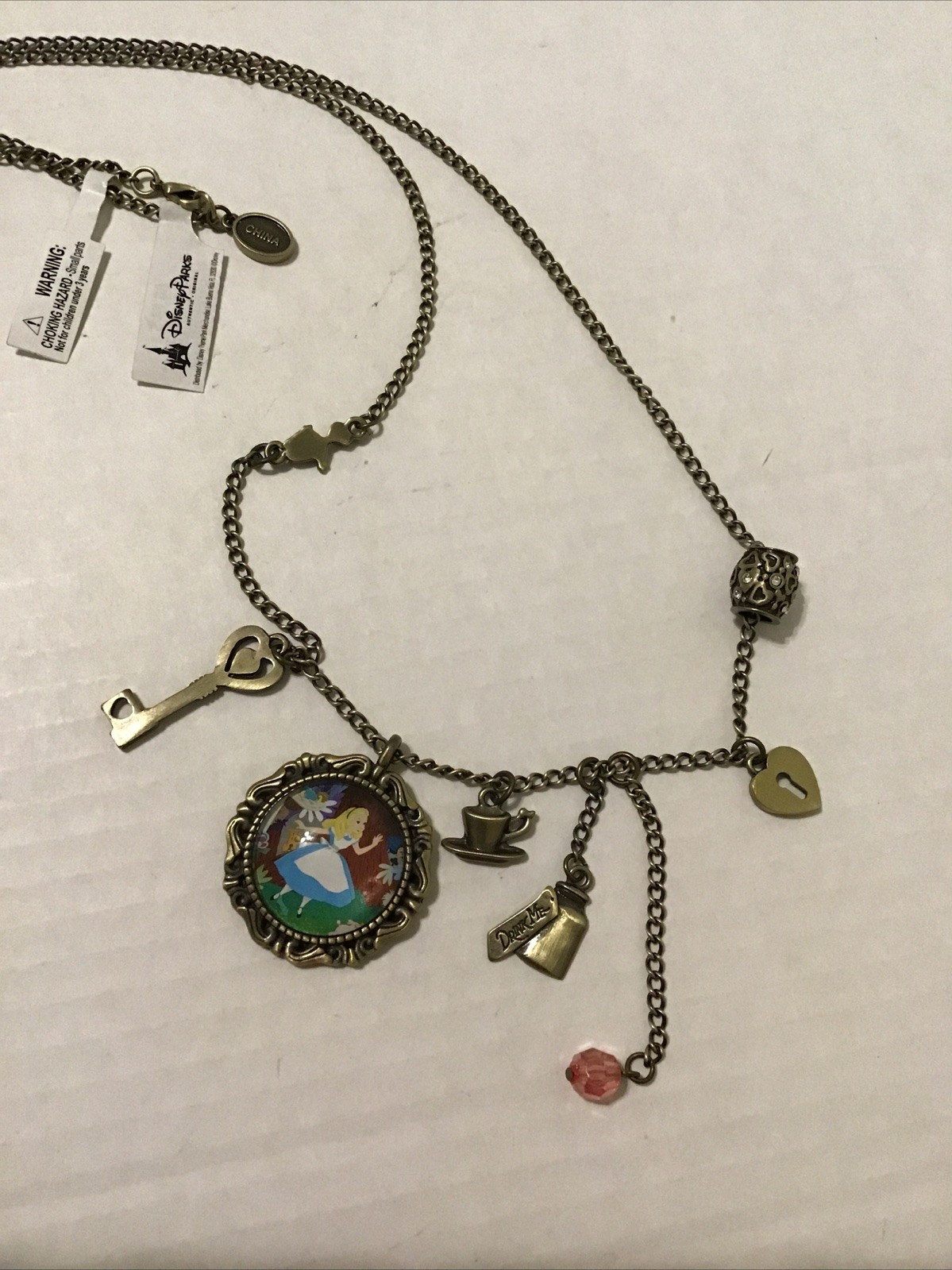Alice In Wonderland Gold Color Pendant Necklace And Charms Retired 24” NWT