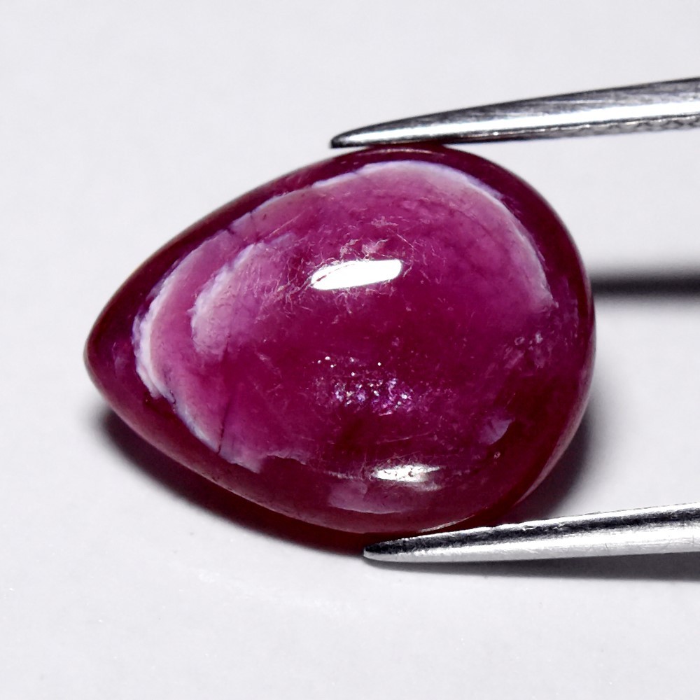 💎 8.31ct Pear Cabochon Purplish Red Ruby – Heated Glass Filled, Africa Gemstone