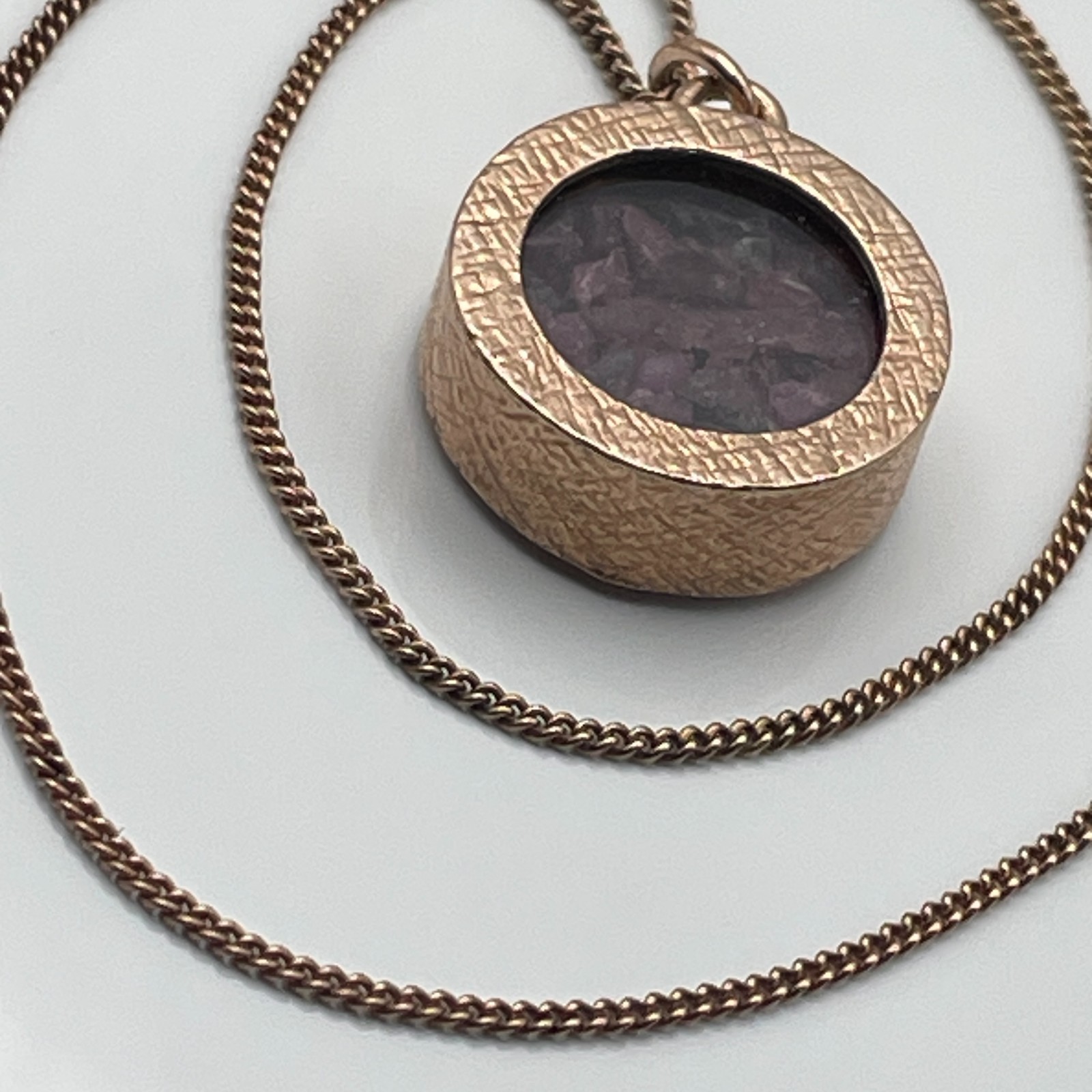 Rose gold on sterling silver/ruby amulet pendant and ‘925’ chain necklace 10.26g