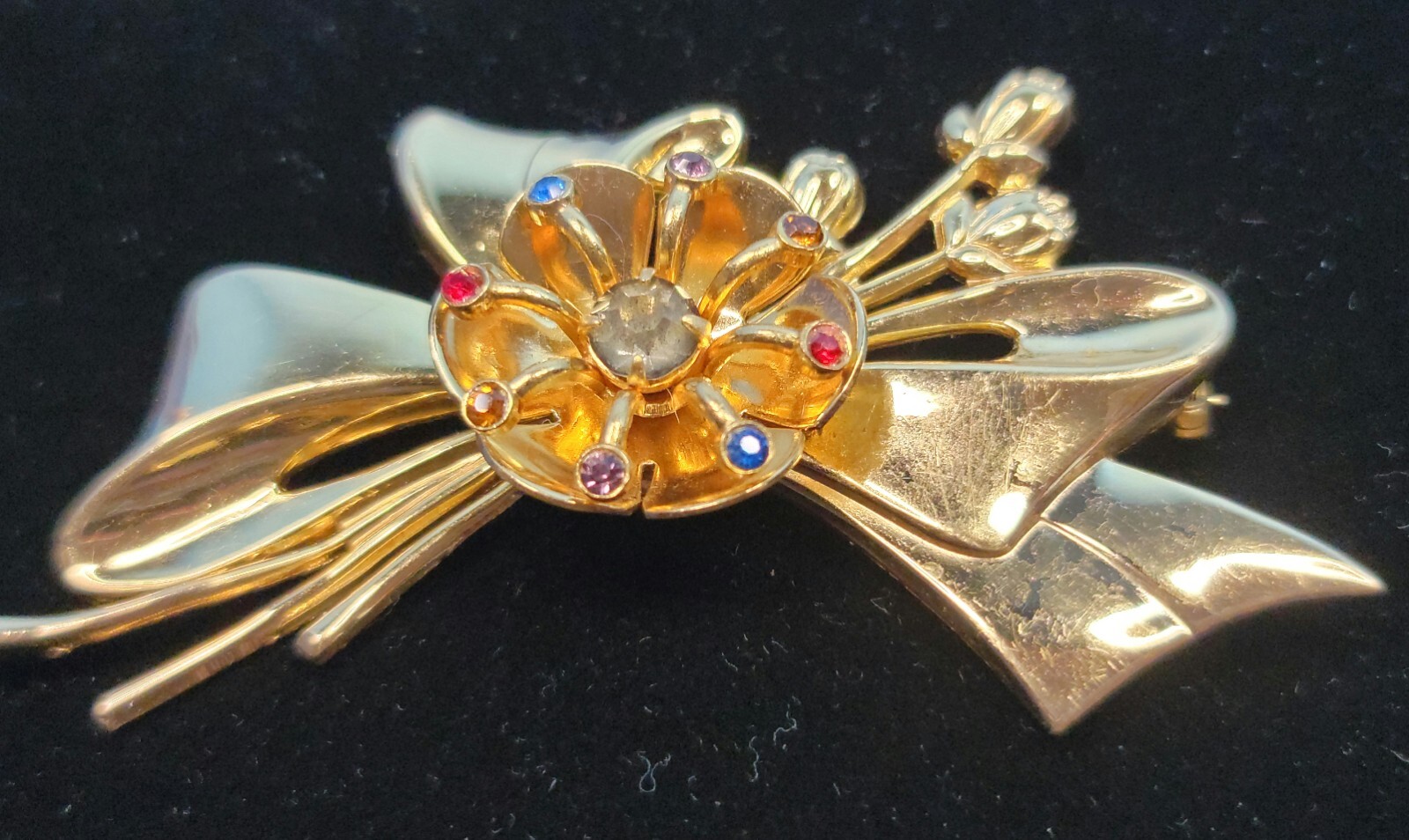 Vintage Goldtone Bow Floral Studded W/Various Colored Rhinstones Brooch