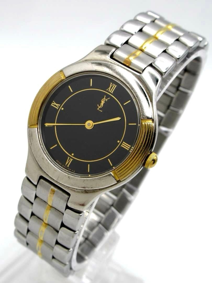 Yves Saint Laurent watch 4620-E66661Y, black dial, working condition.