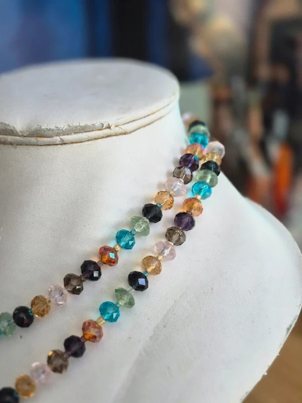 Multi coloured glass cut beads, on long string necklace,