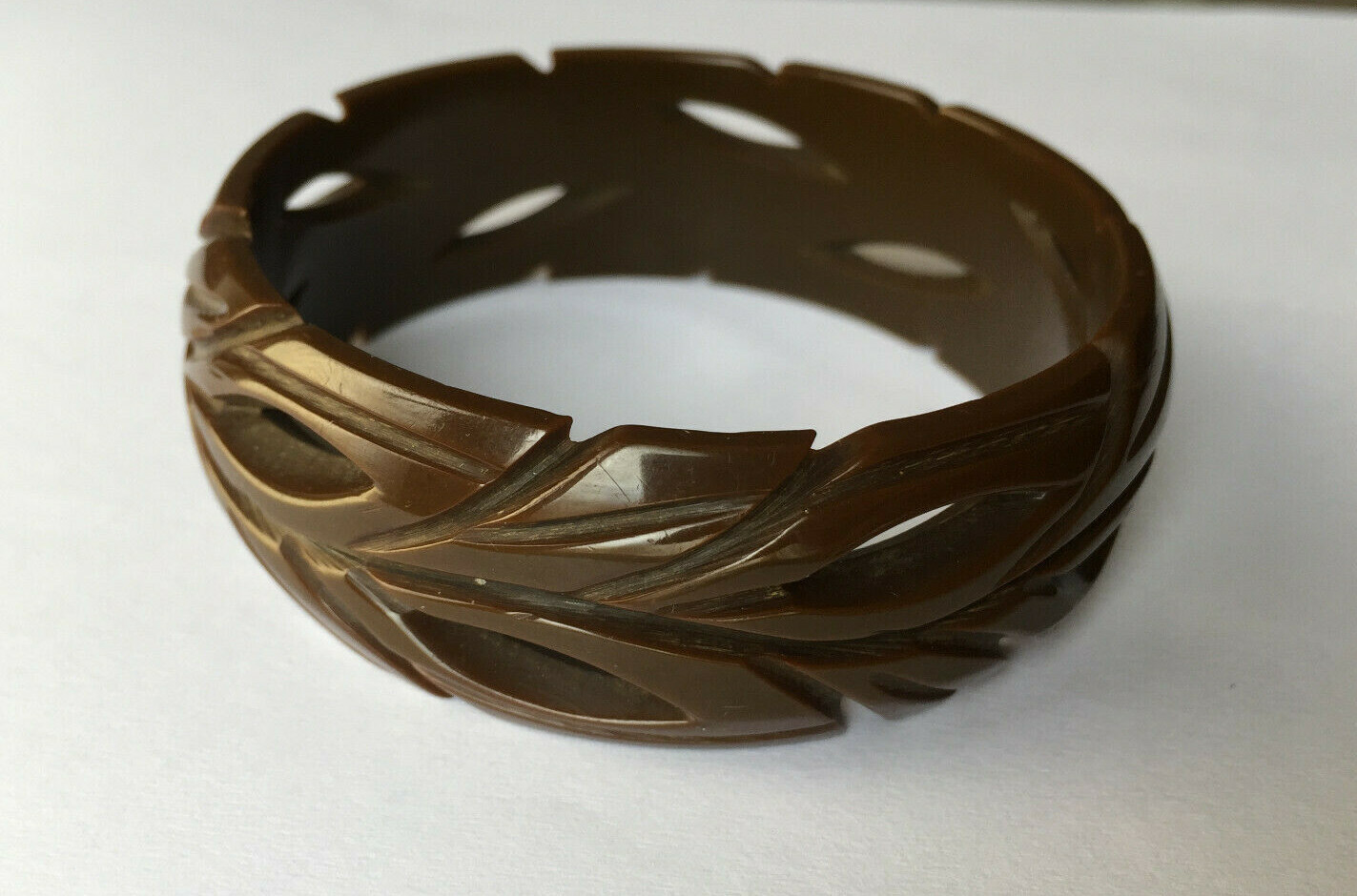 Vintage Bakelite 2.56” Carved leaves Bakelite bangle in dark brown color 1”