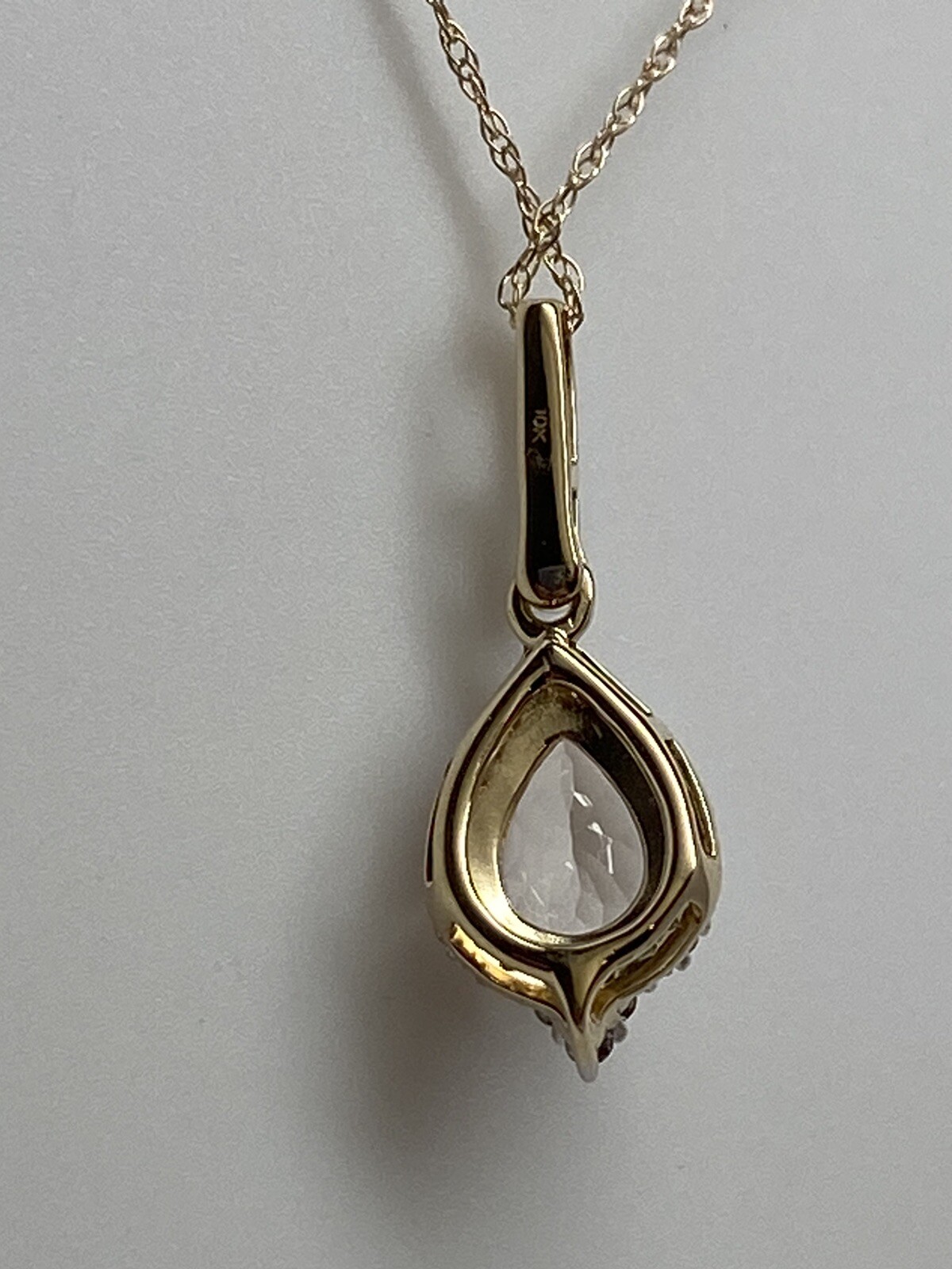 10K Yellow Gold Pear Shape Morganite and 0.11ct twt. Diamond Pendant with Chain