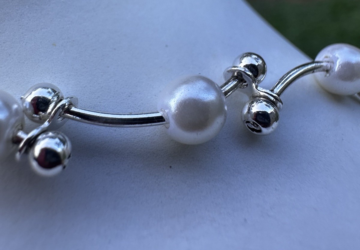 Elegant Twisted Faux Pearl Necklace with Silver-Tone Finish