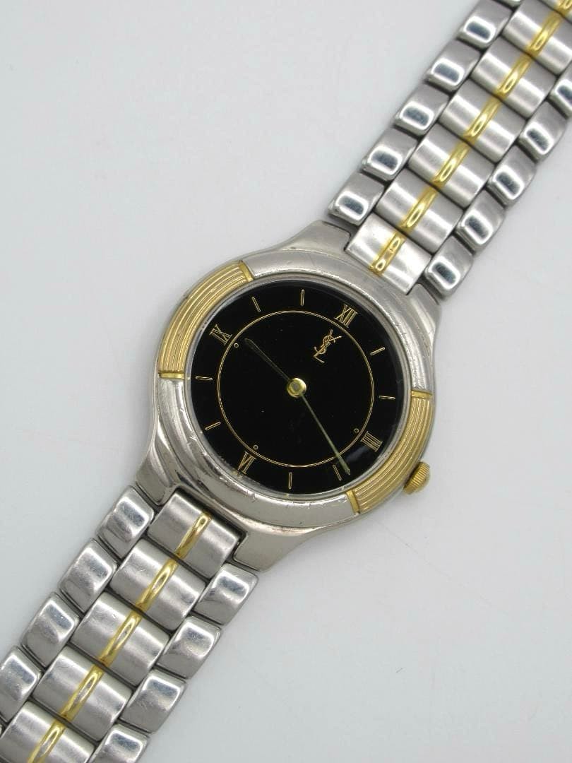Yves Saint Laurent watch 4620-E66661Y, black dial, working condition.