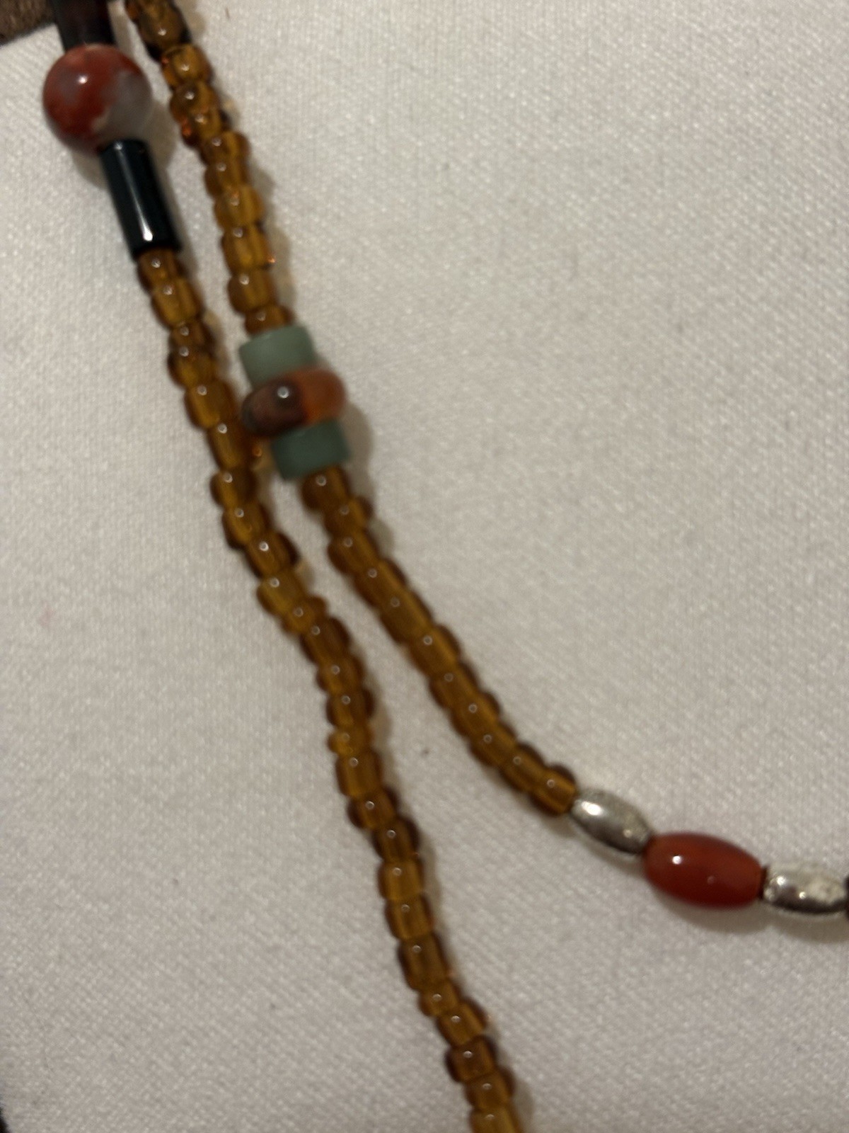 Brown, orange and turquoise glass beaded layered brass sunflower
