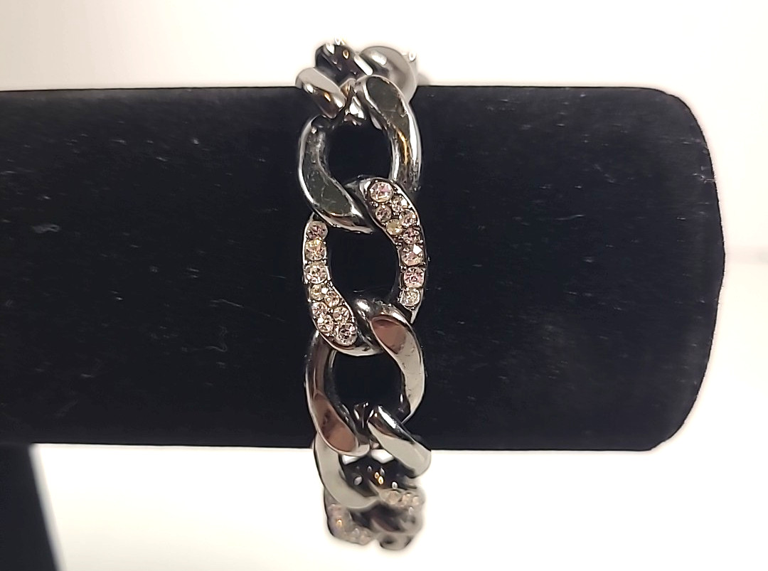 Gunmetal Toned Curb Link Bracelet with Crystal Accents.