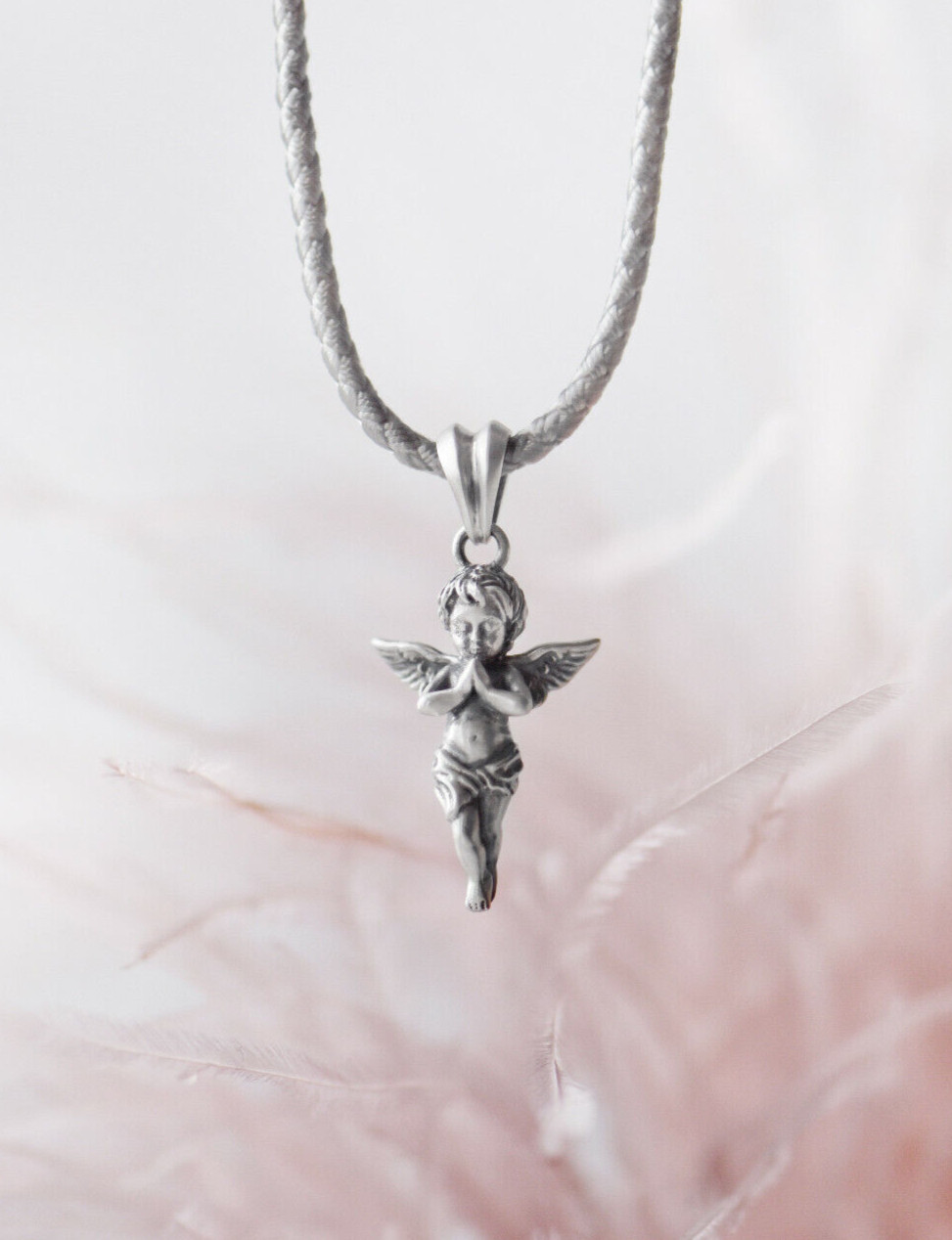 Angel. Pendant. Sterling silver,oxidised.