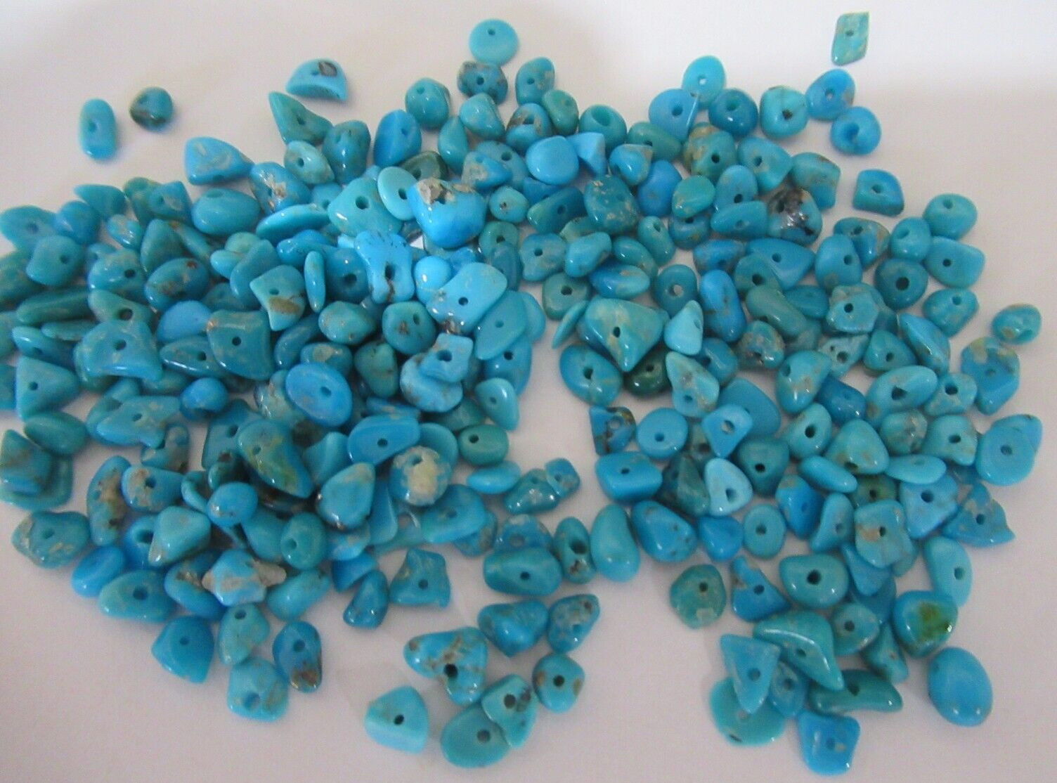 SLEEPING BEAUTY TURQUOISE 1/2 OZ SMALL DRILLED NUGGETS 4X3mm TO 7X4mm #642