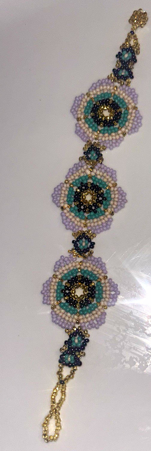 Multicolor Glass Beaded Charm Bracelet with Round Medallion Motifs