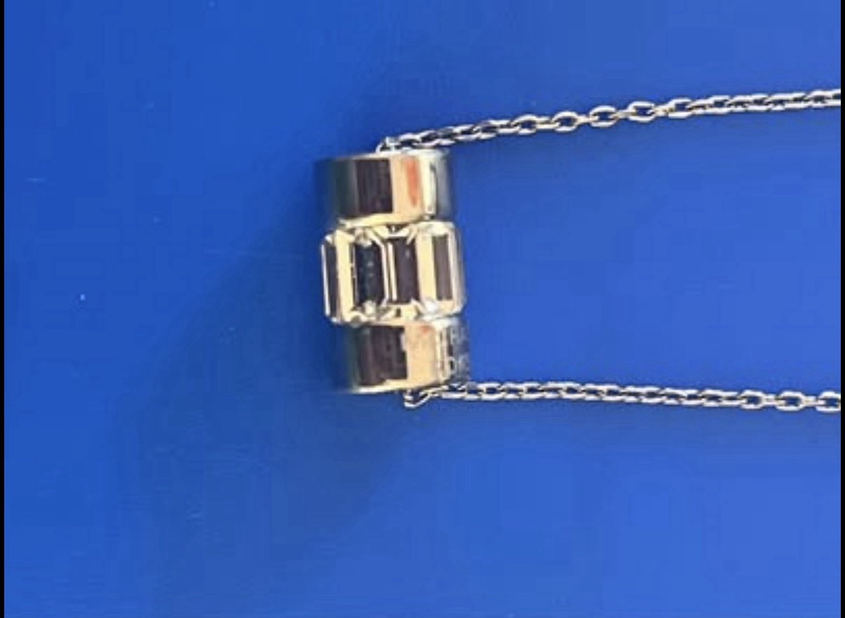 Michael Kors Silver Tone Crystal Baguette Barrel Pendant Necklace