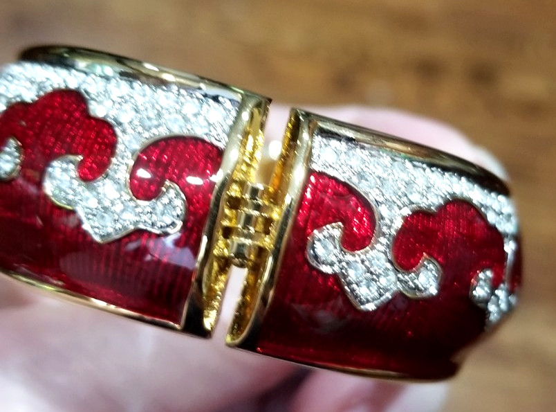 Bejeweled cuff bracelet with Red enamel and Gold tone metal Mint condition