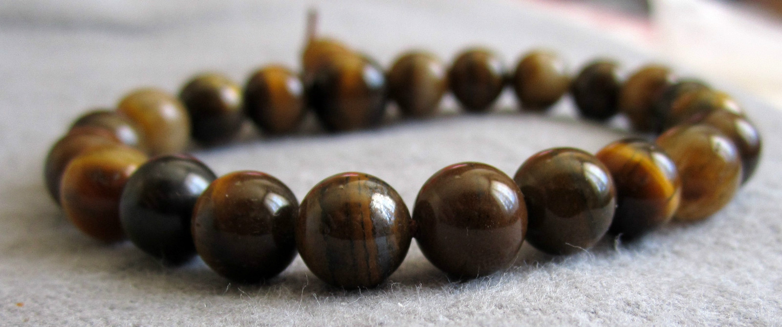 Buddha-Armband aus Tigerauge braun 15 bis 20 cm / Südafrika – Power-Beads.