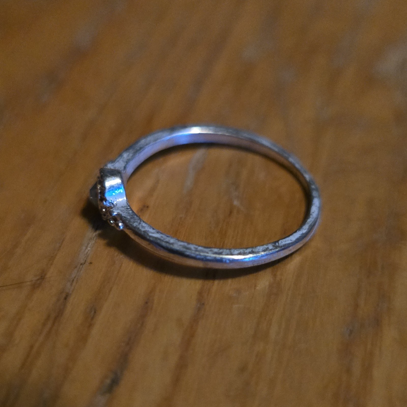 Silver Tone Metal Band Ring Size 8.5 Round White Stone Clear Accent Stones