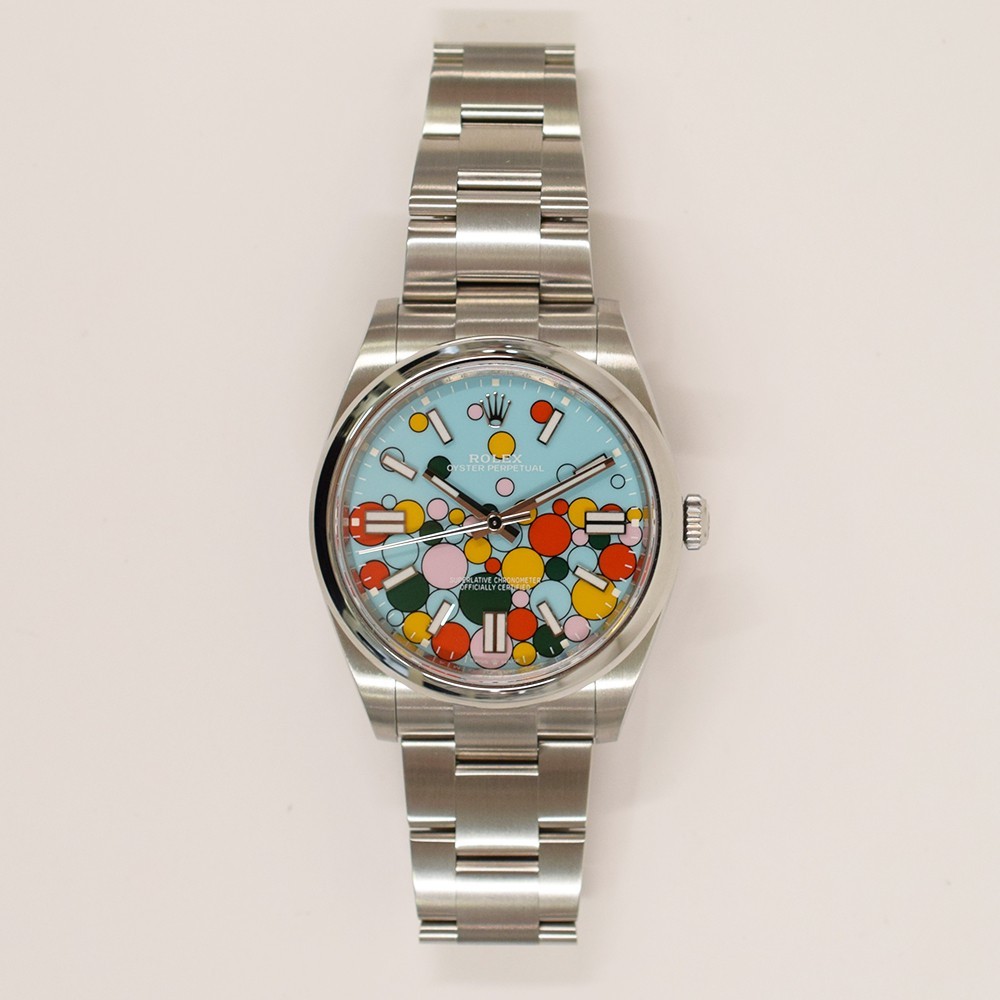 Rolex Oyster Perpetual 41 124300 Celebration Dial Steel Box & Papers Mint