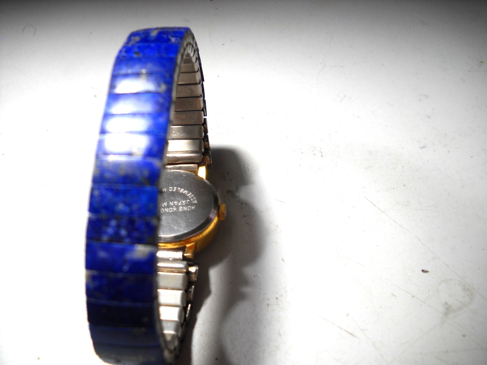 447L Gem Time Lapiz Lazuli set in 22mm gold tone case rinestone bazel 11mm band