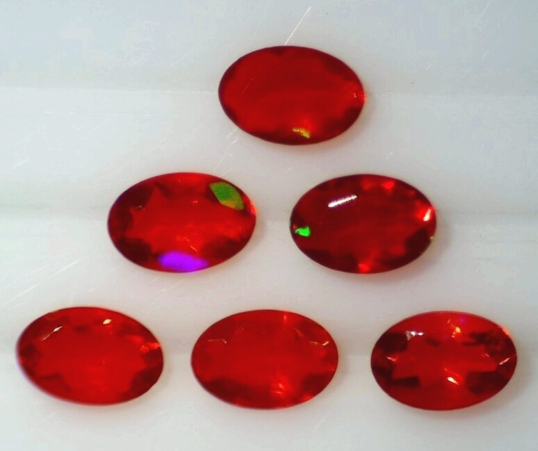 CHERRY OPAL 9.00 x 7.00 MM OVAL CUT ALL NATURAL SOLD PER STONE F-303