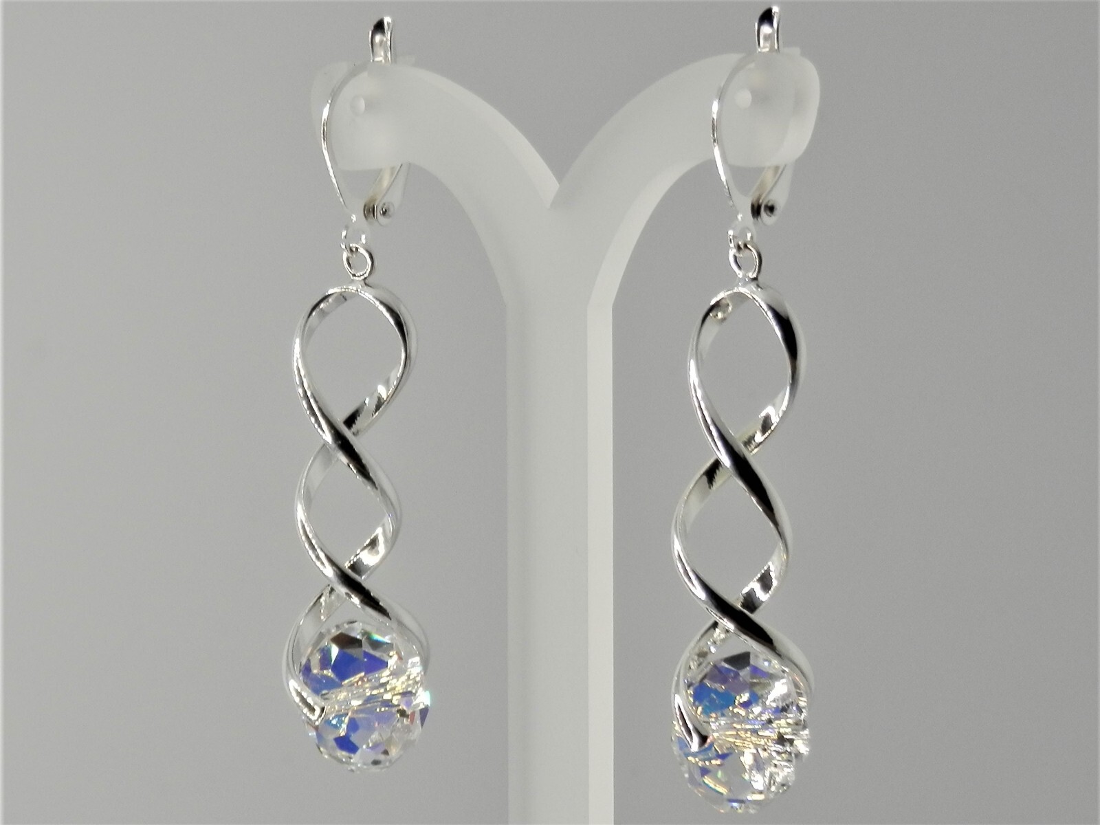 Austrian Crystal, clear with AB, spiral silver plated, clip-on, lever back