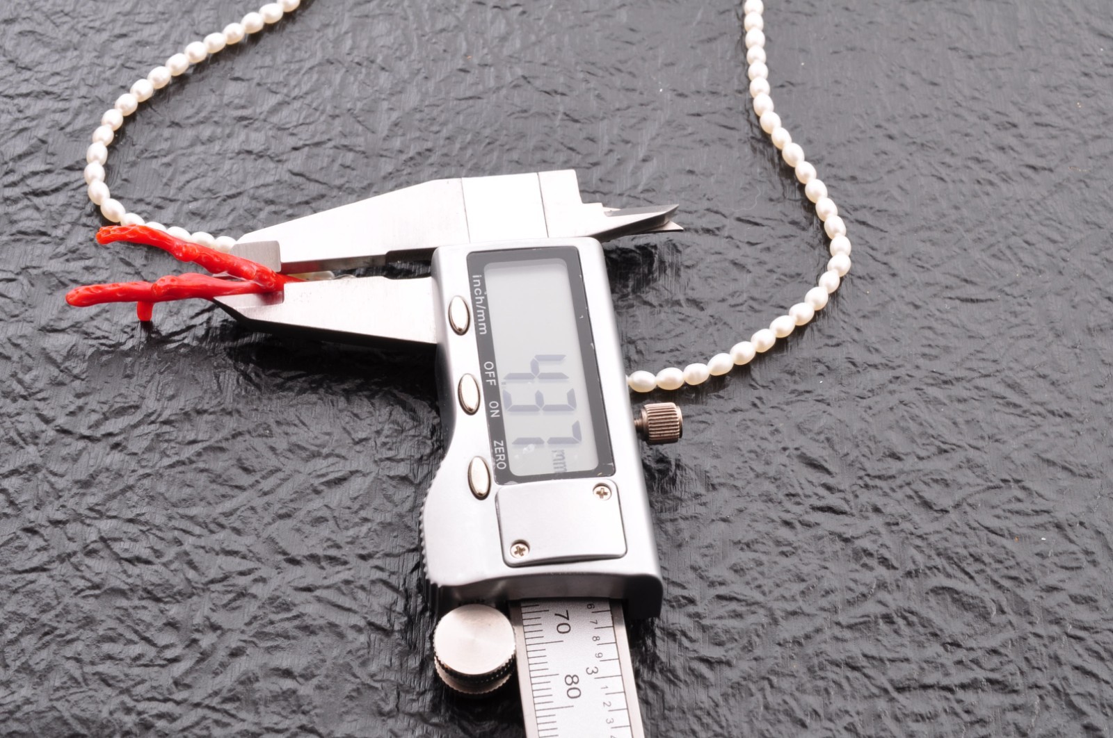Sterling silver clasp, red coral and pearl pendant (total 54.0ct) Certification.