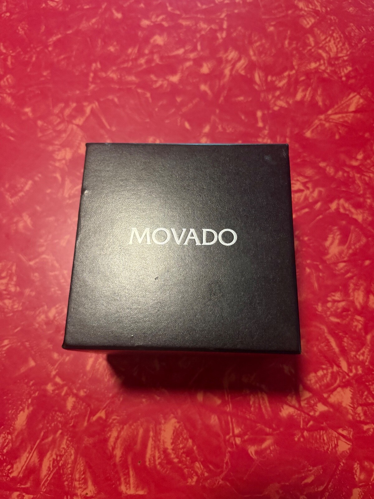 MOVADO 800 SERIES WATCH WITH BLCK BEZEL AND DIAMOND MAKERS – MENS WATCH