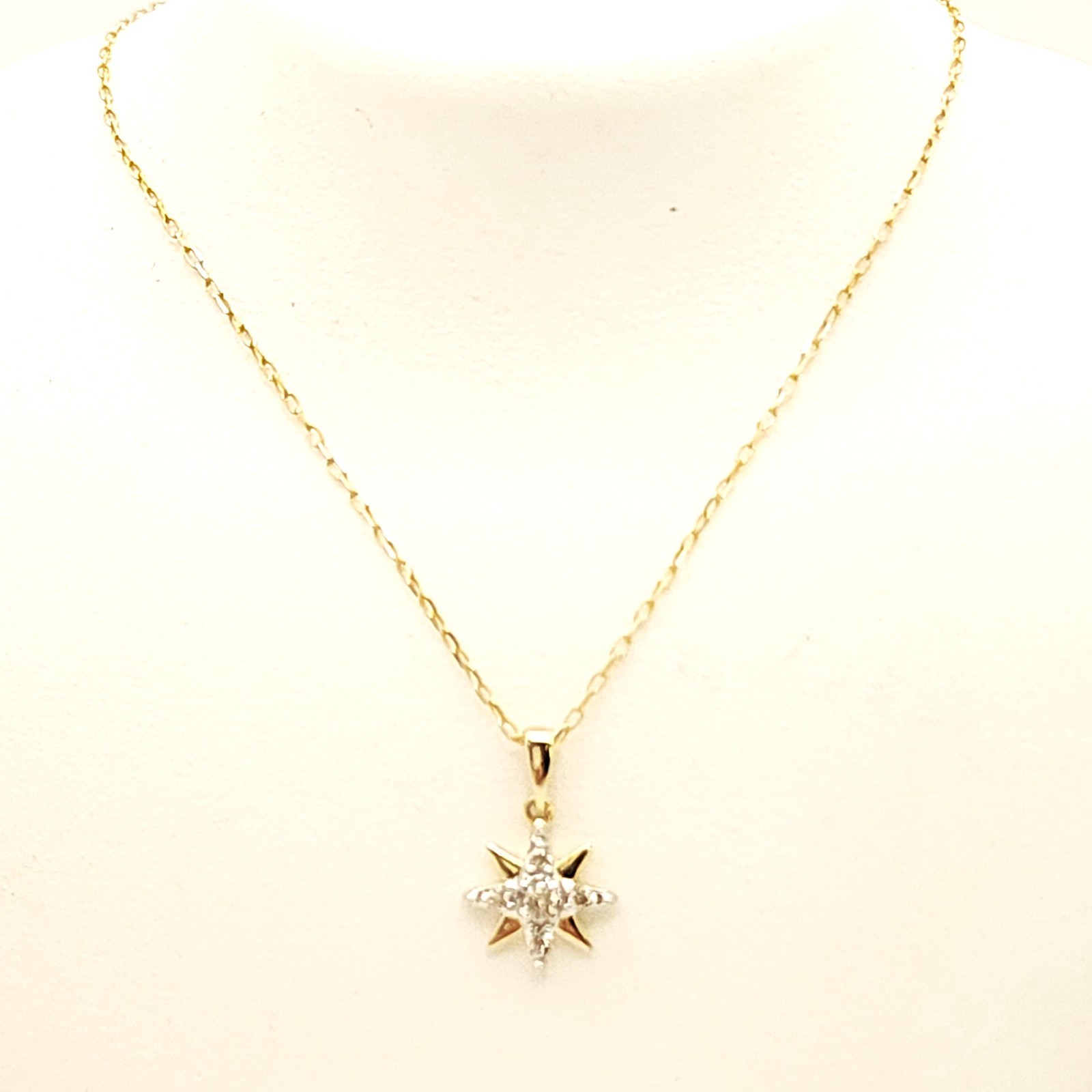 10k Gold Star Diamond Pendant on 10k Gold Chain Size: 16-18″ X 0.57mm