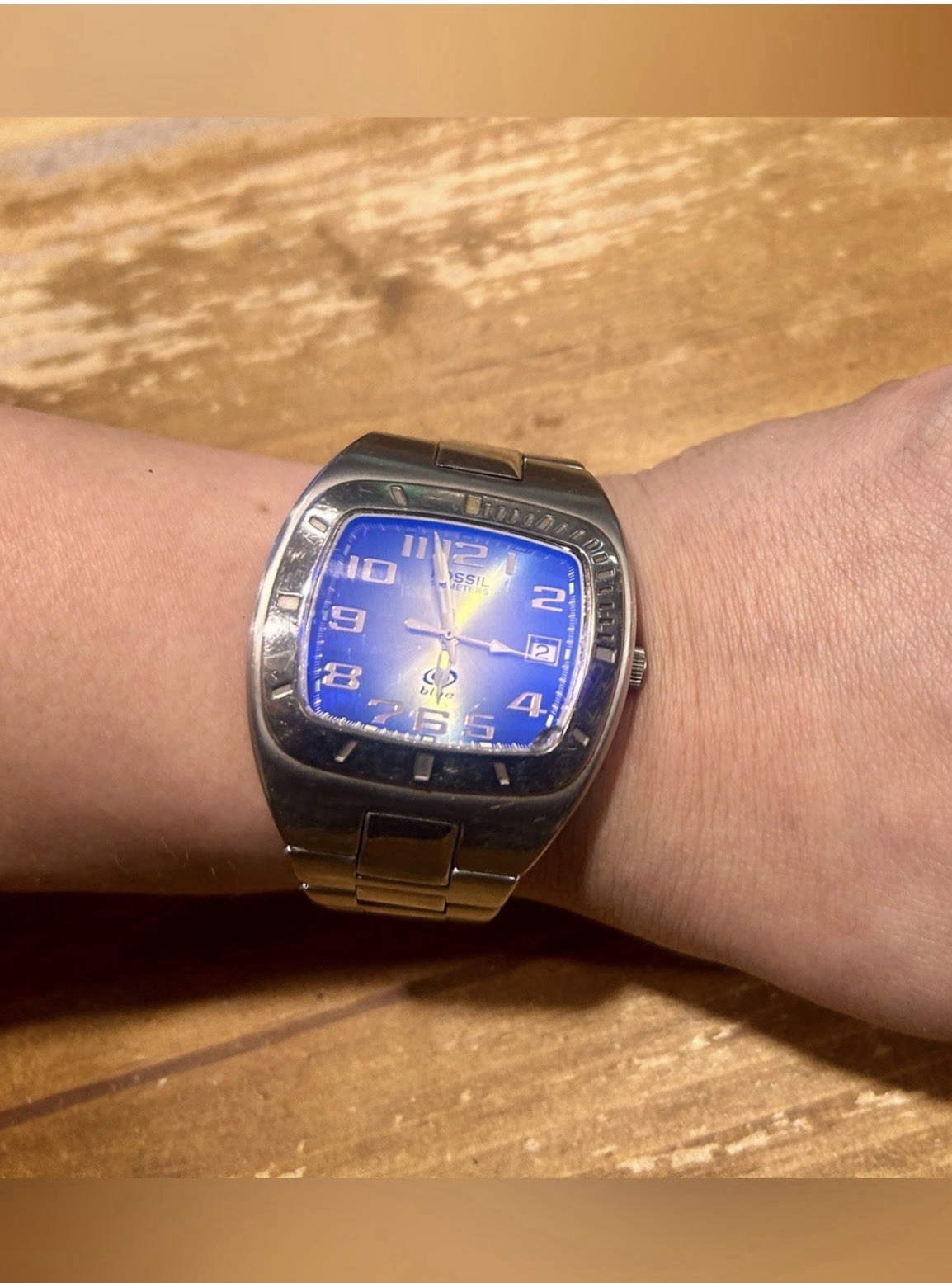 Vintage Fossil Blue stainless steel watch with Blue-to-Yellow Gradient Dial.