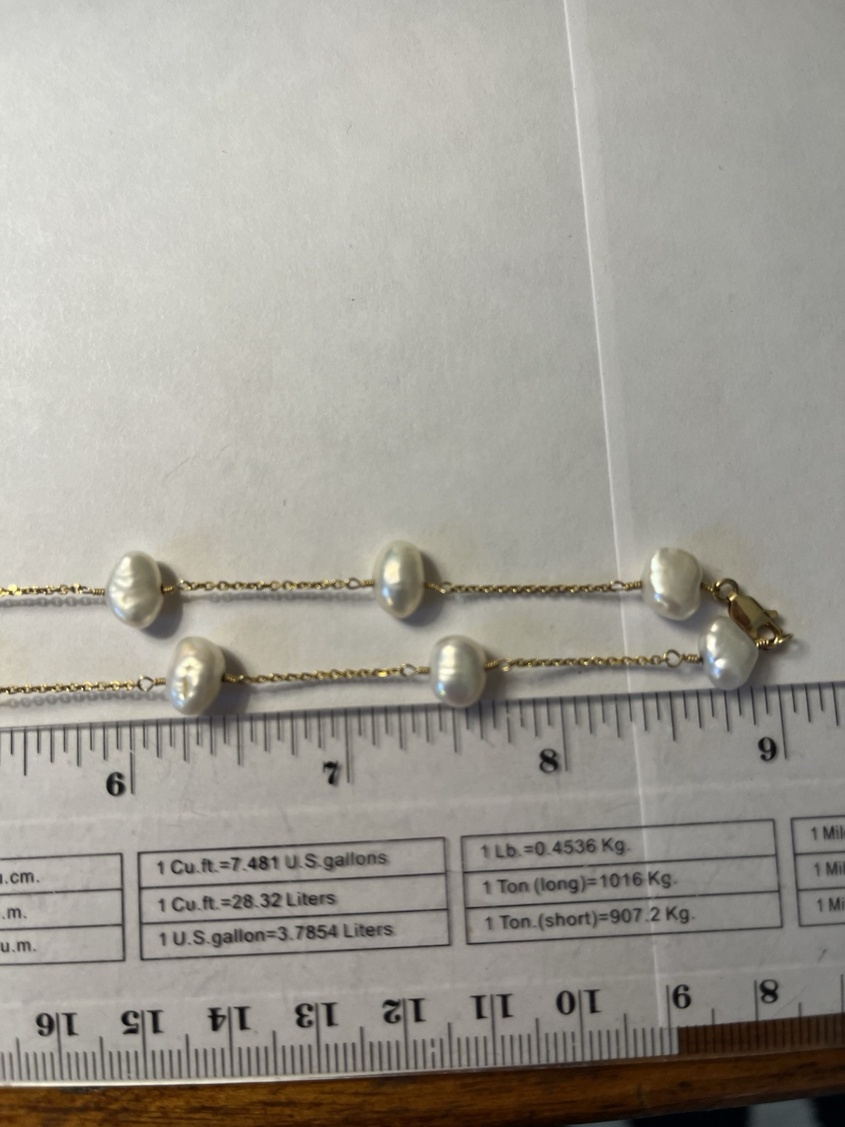 Stunning 14K gold 18″ pearl station necklace heavy 8.8 Grams.
