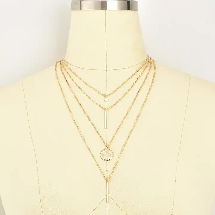 Four (4) Layered Multi Chain Gold Necklace, Column, Pendant and Star