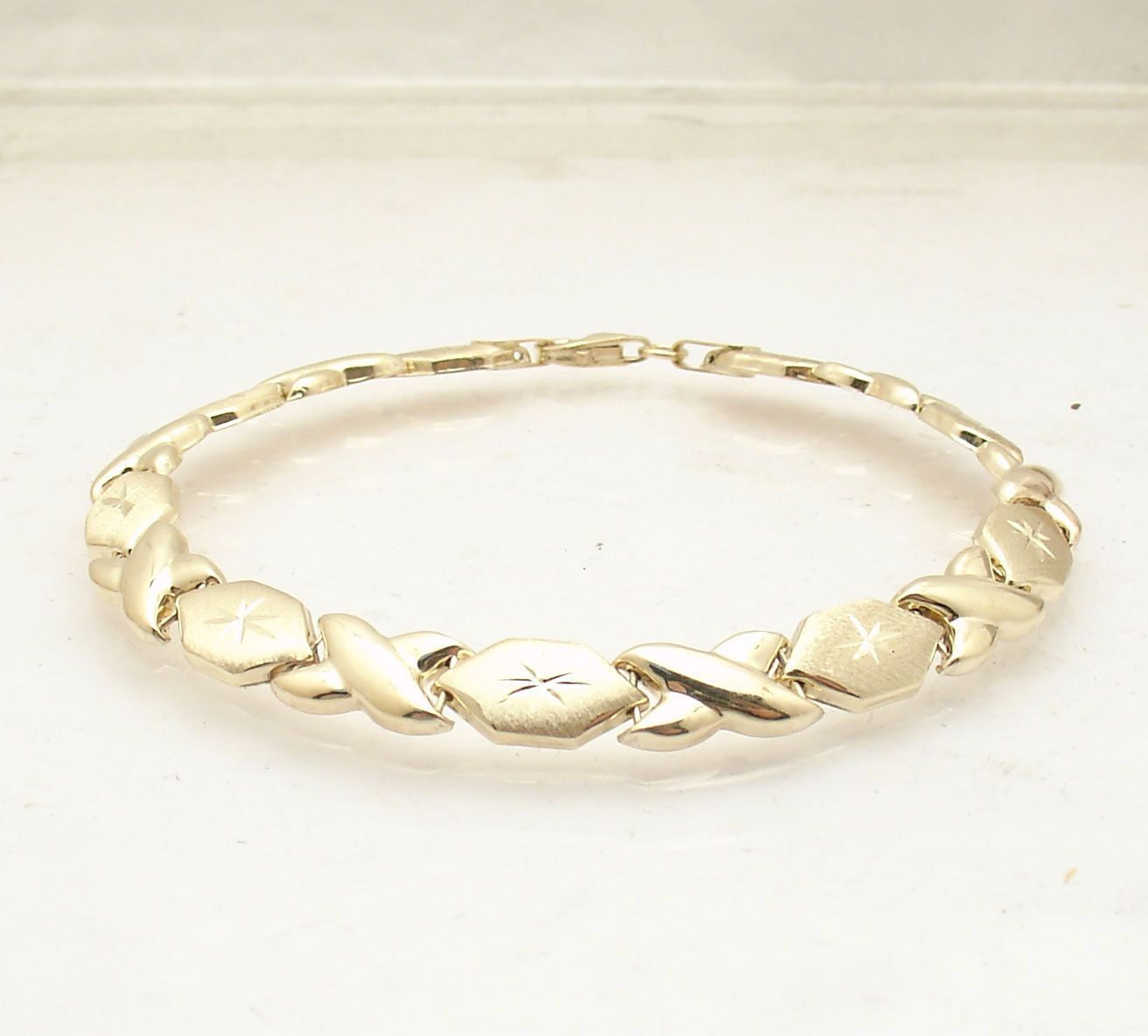 7.25″ Diamond Cut Hugs and Kisses Stampato Bracelet Real 14K Yellow Gold
