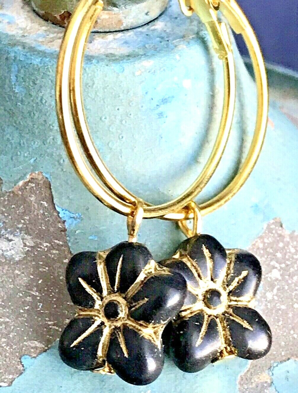 Beautiful Etched Black and Gold Flower Hoop Earrings.
