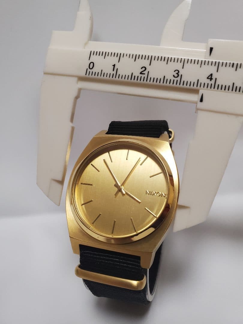 NIXON TIME TELLER GOLD/BLACK, brand new, unused, and fully functional.