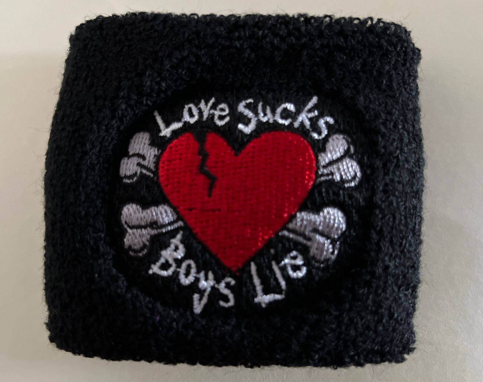 Love Sucks Boys Lie Wristband Sweatband