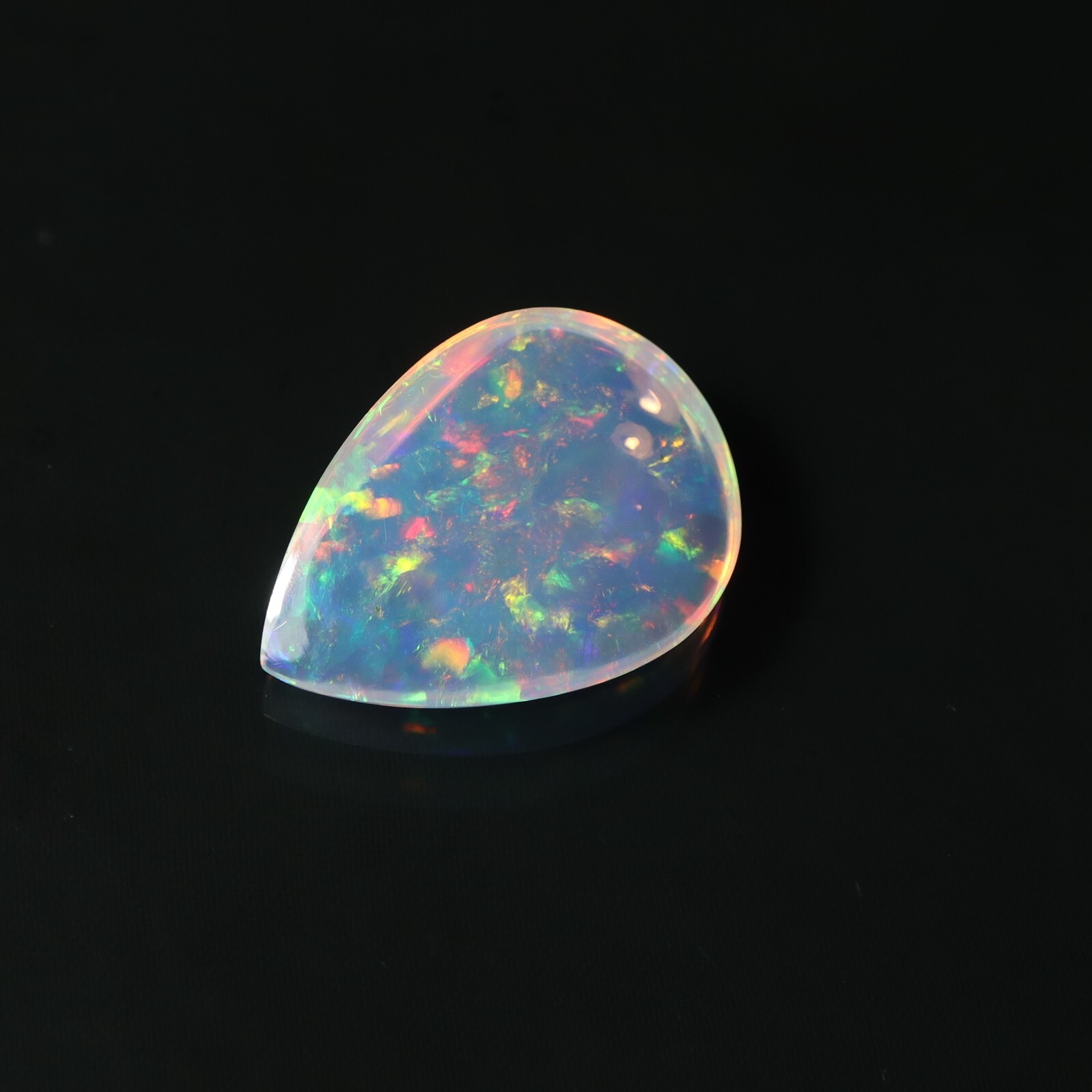 9 Carat 21.9×15.9 MM Natural AAAA Rainbow Fire Ethiopian Welo Opal Pear Shape